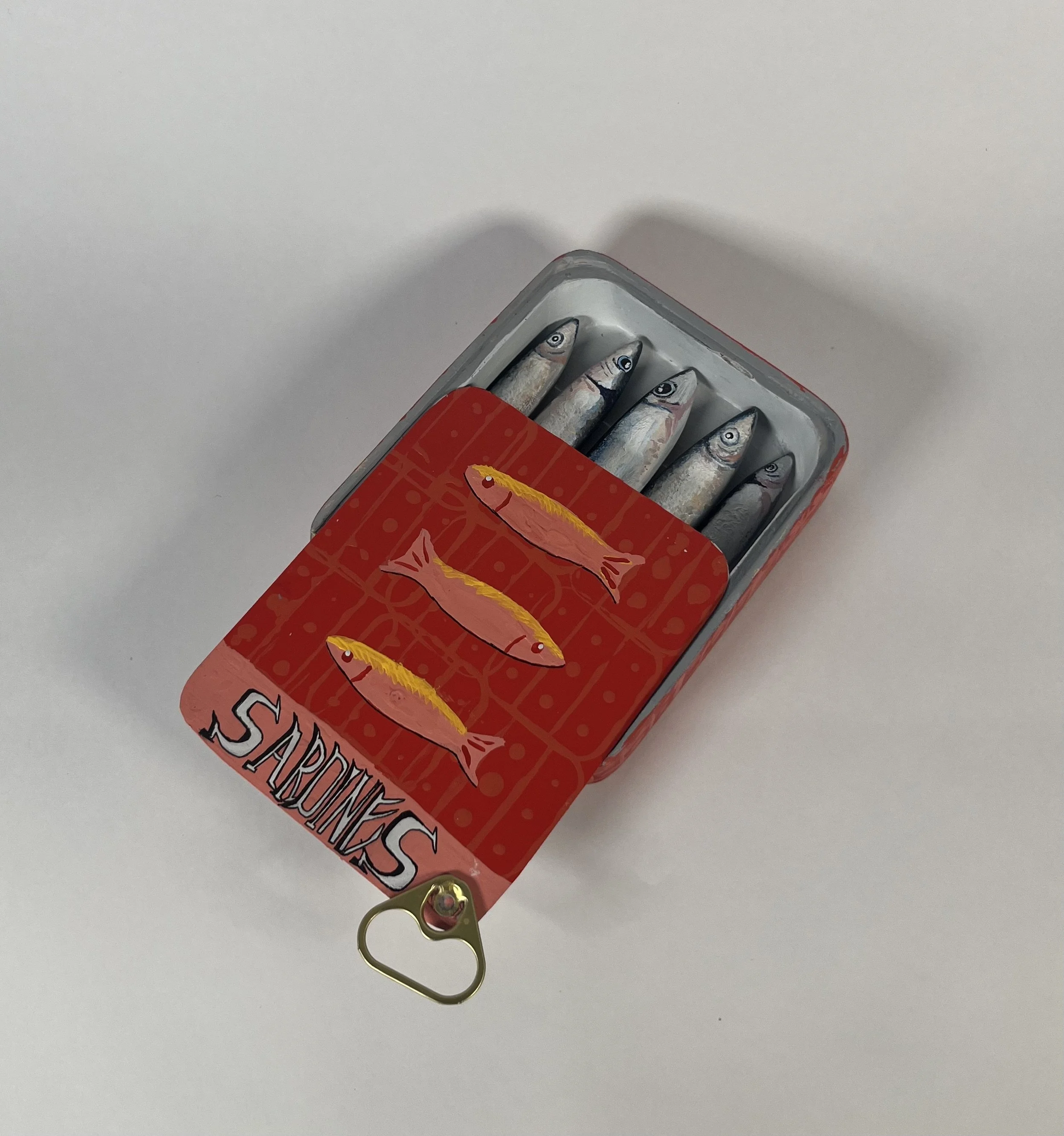 "Sardinez"
4 ½”  x 6”  x 2” , 
Acrylic and Nail polish on Wood
2025