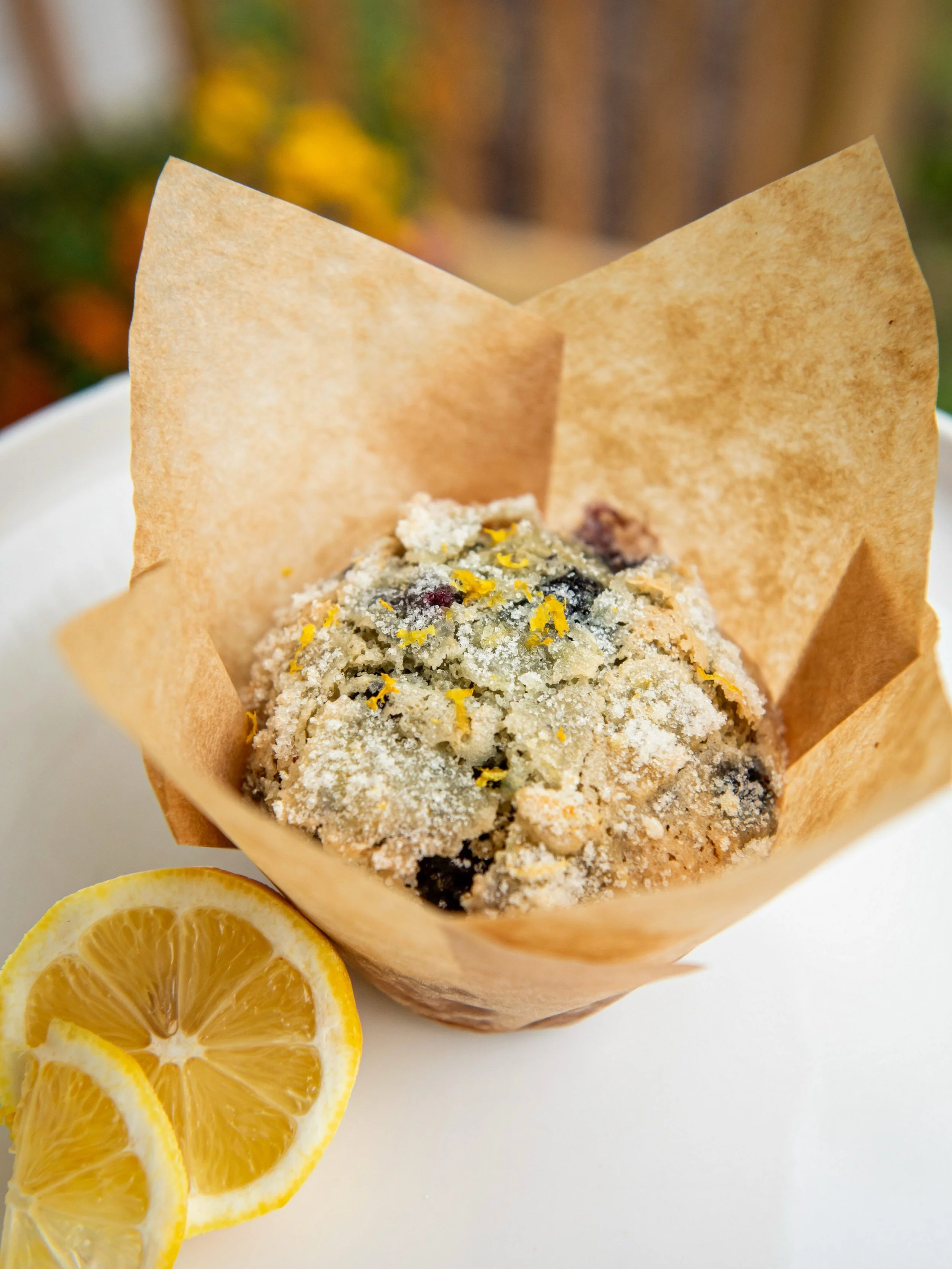 She&rsquo;s new, she&rsquo;s beautiful, and she&rsquo;s got a sprinkle of lemon sugar on top! This Lemon Blueberry Muffin is joining the menu (have no fear, I will still be making the Lemon Blueberry Bread sometimes as well!). Grab one (or two) this 