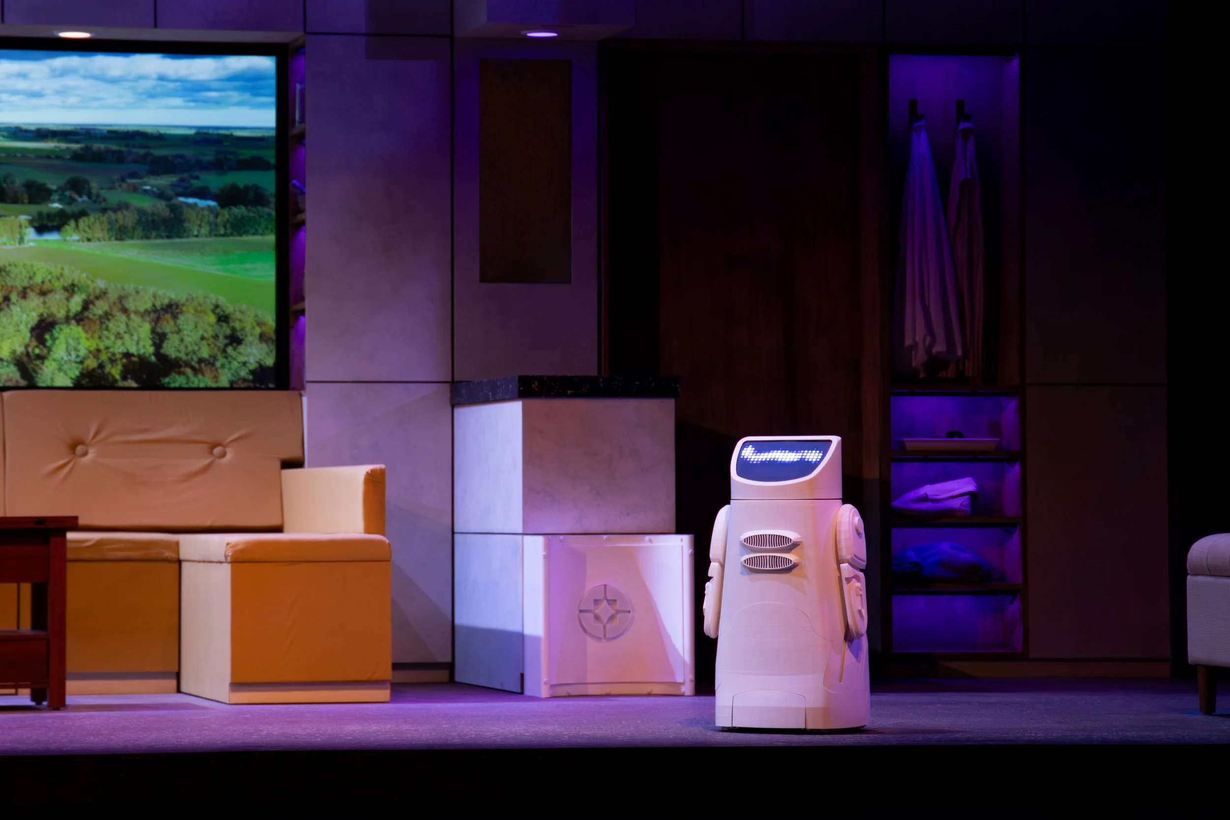 This is Arthur! For most of the play, I stood off stage right at a microphone and voiced this wonderful bot.