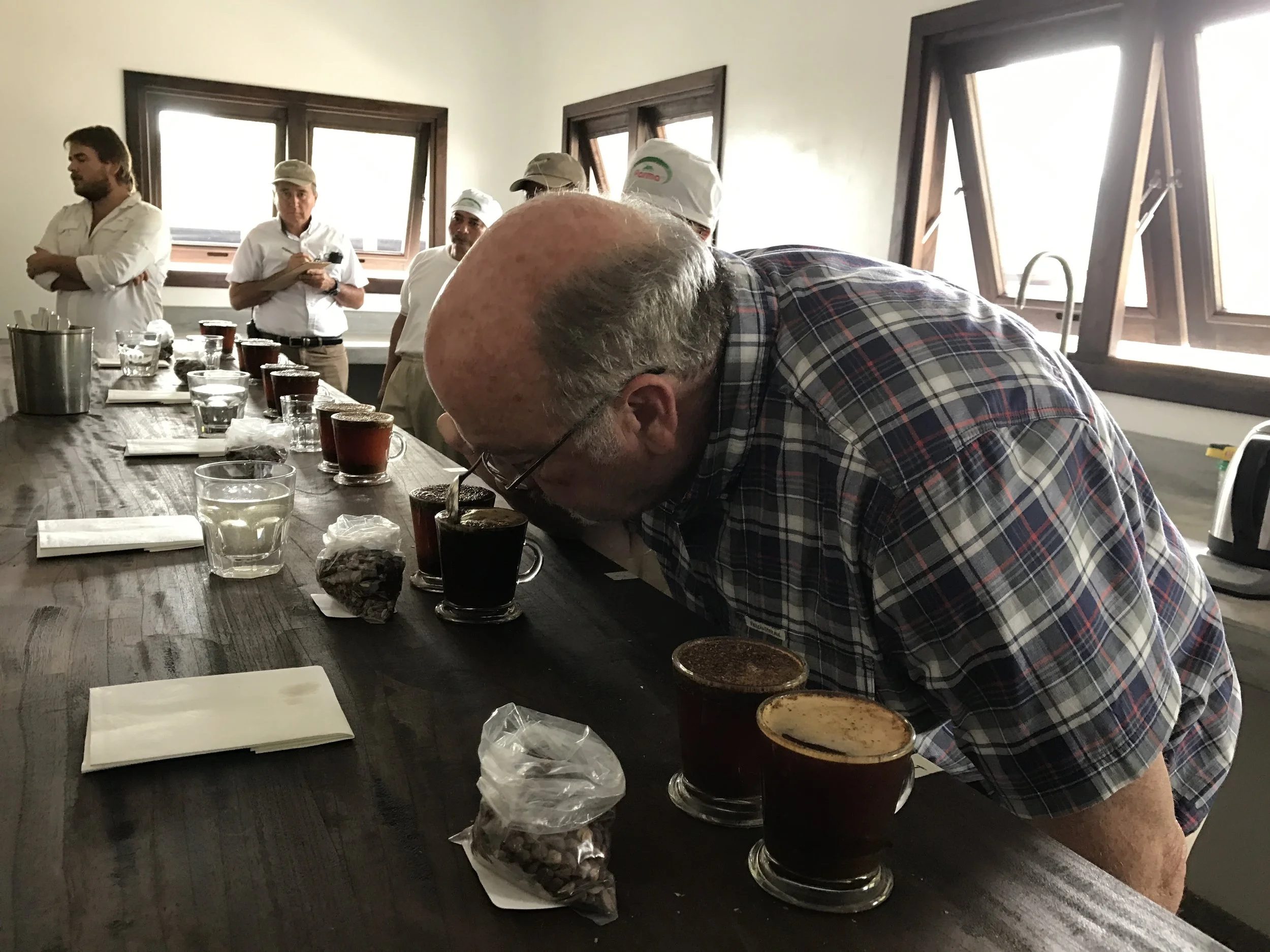 John cupping coffee for quality