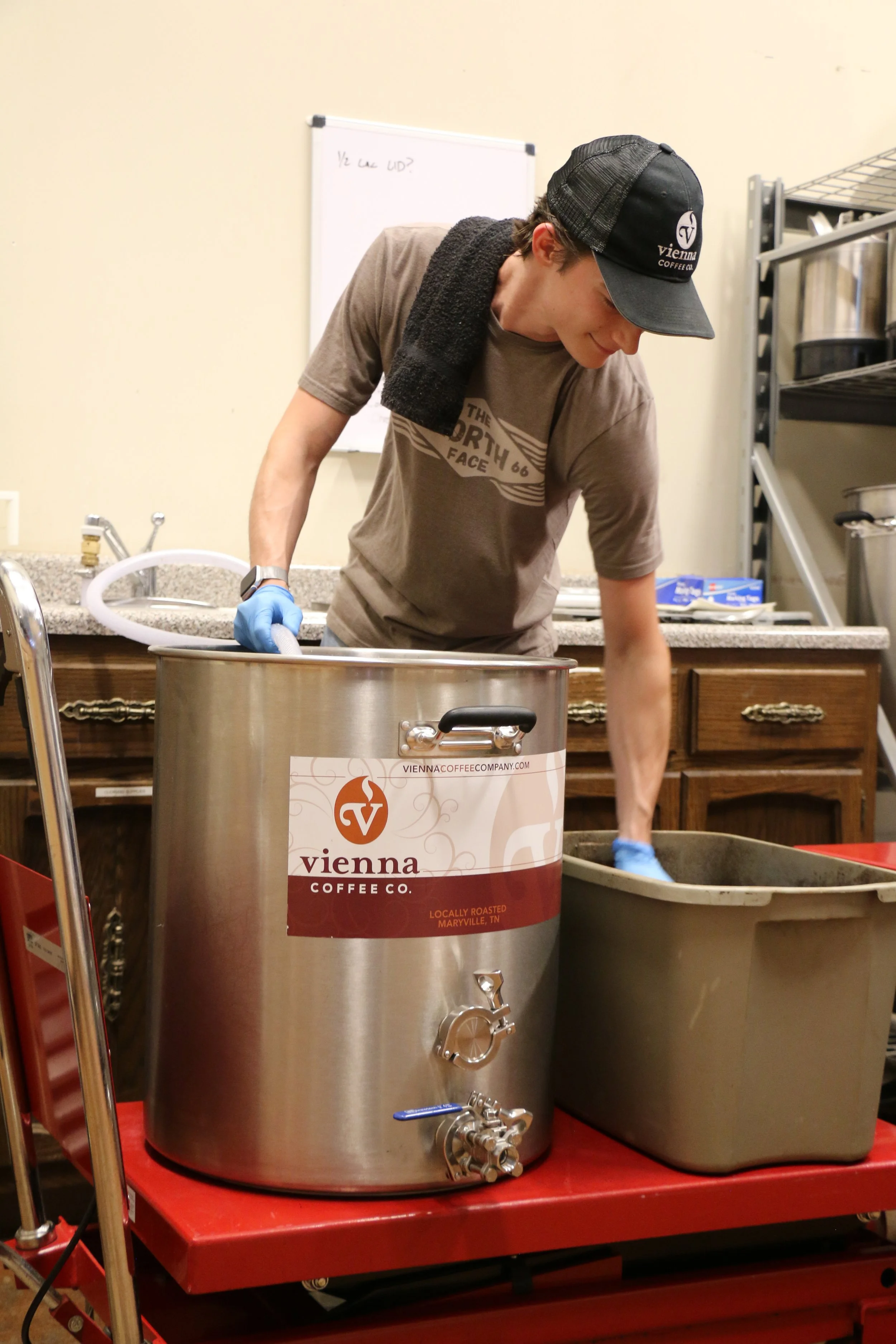 Hand mixing grounds to brew