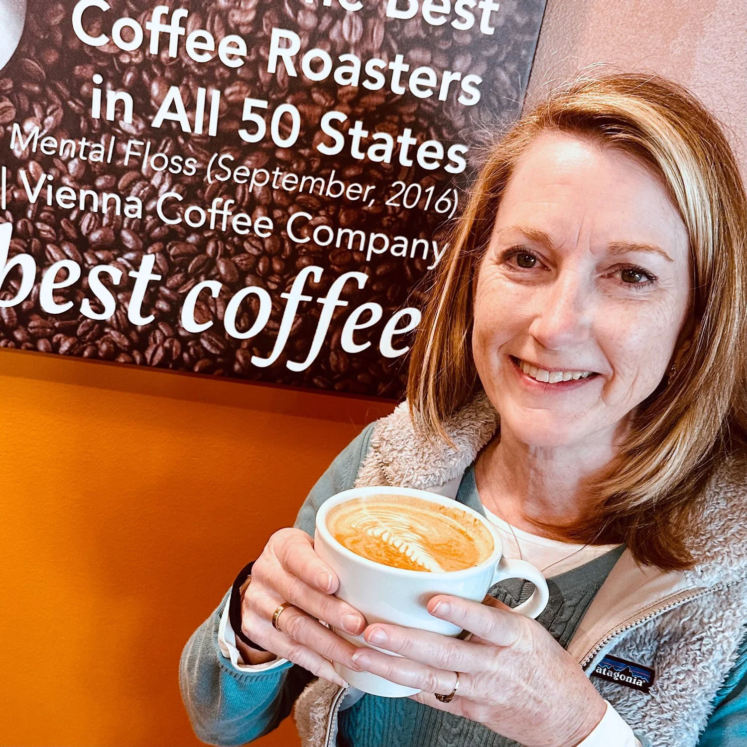 Kelly Wiggins enjoying a latte at Vienna Coffee Company