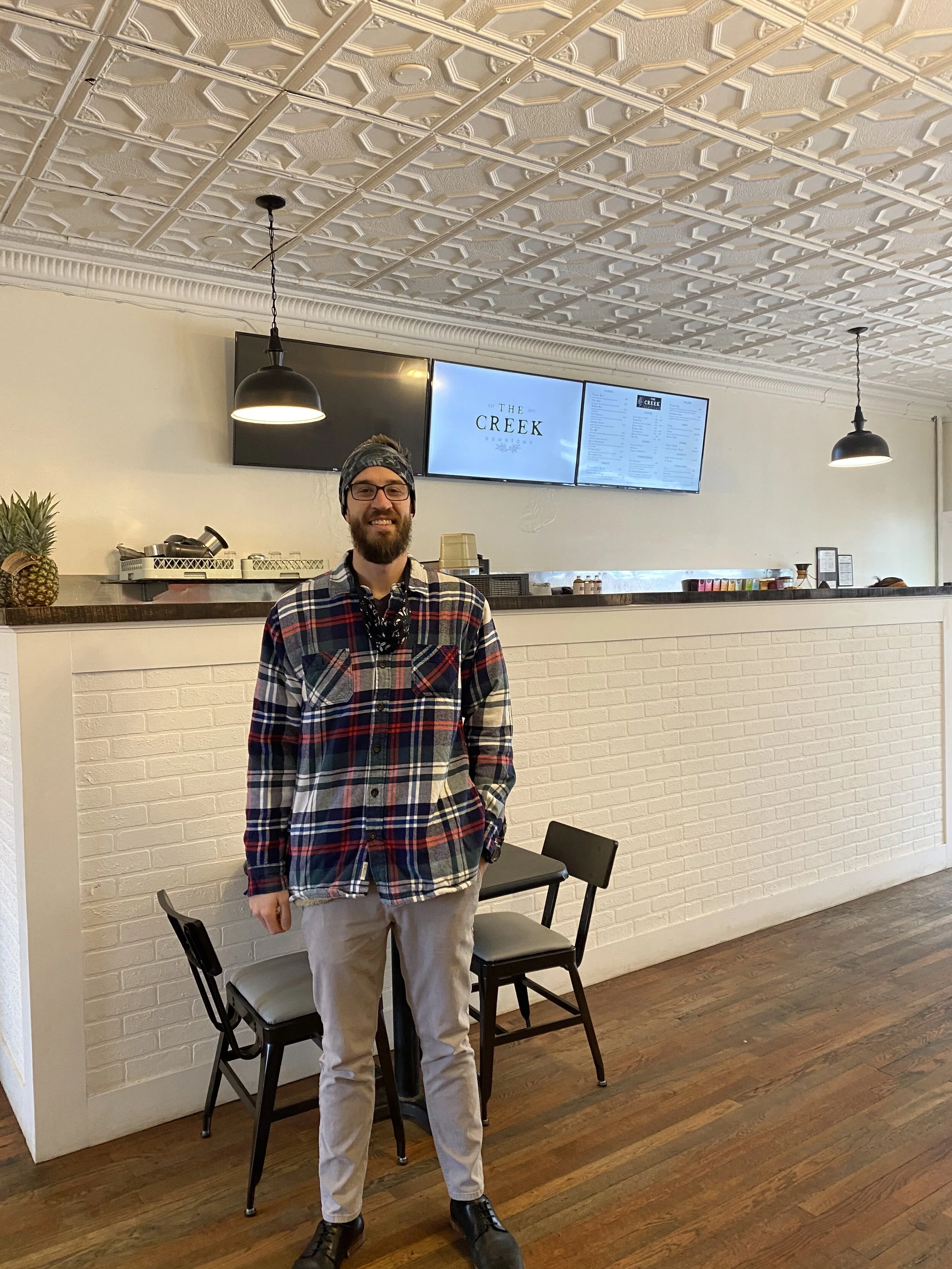 Ben's favorite drink is an Americano, and his wife and co-owner Amanda's favorite is the Maple Pink Salt Latte. When asked if she could have coffee with anyone who would it be she stated her cat because he is a good listener.