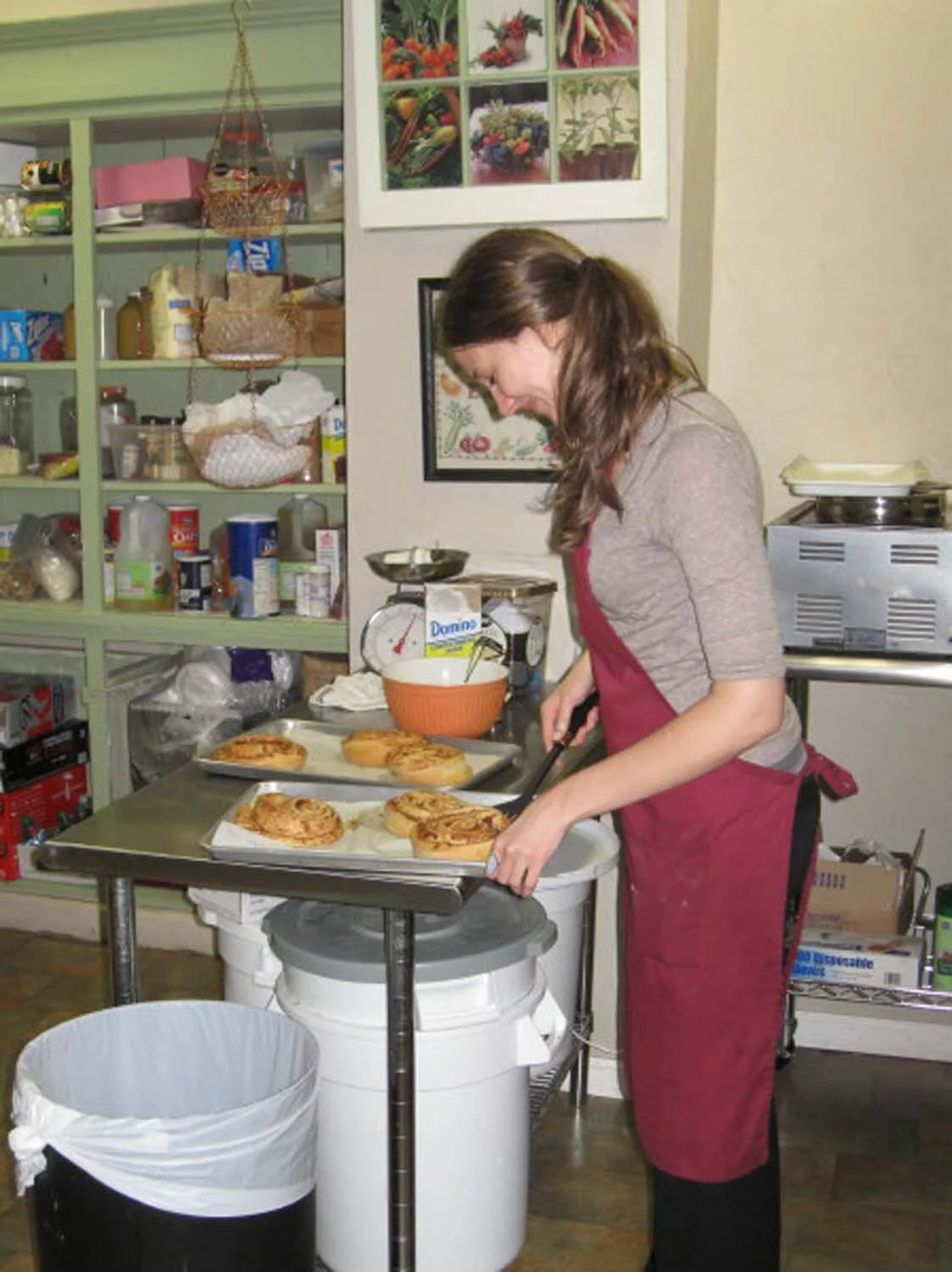Sarah in the kitchen baking delicious treats.