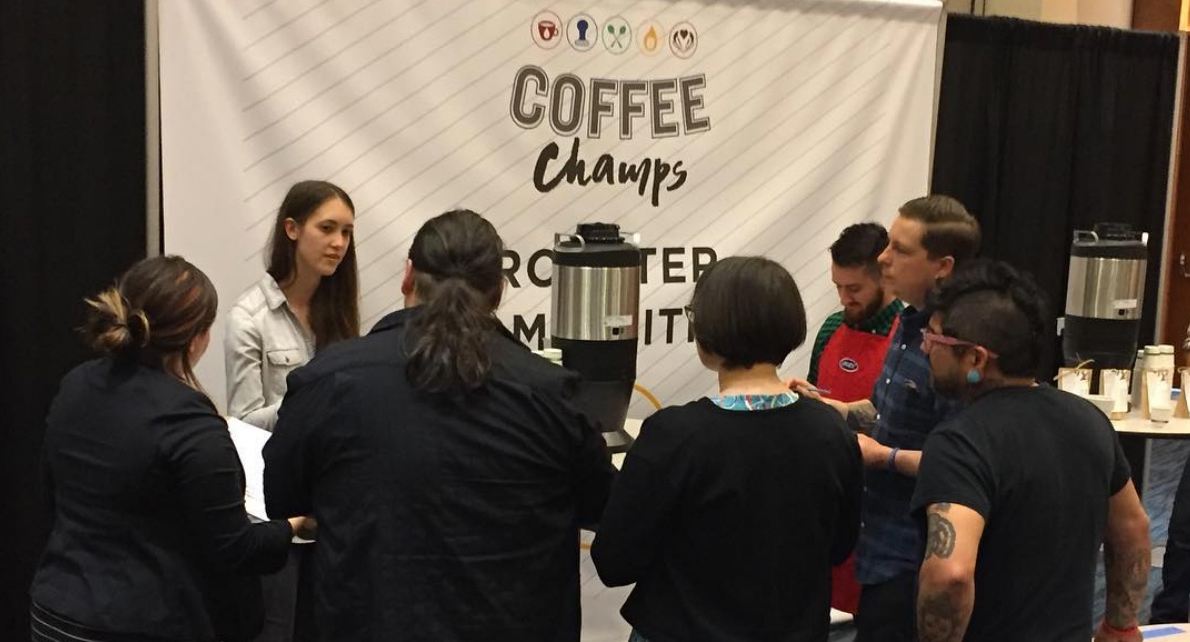 Crisitina, the roaster for our friend's at Deeper Roots Coffee, competing with her version of the Kenya coffee. (John recused himself from this round of judging.)