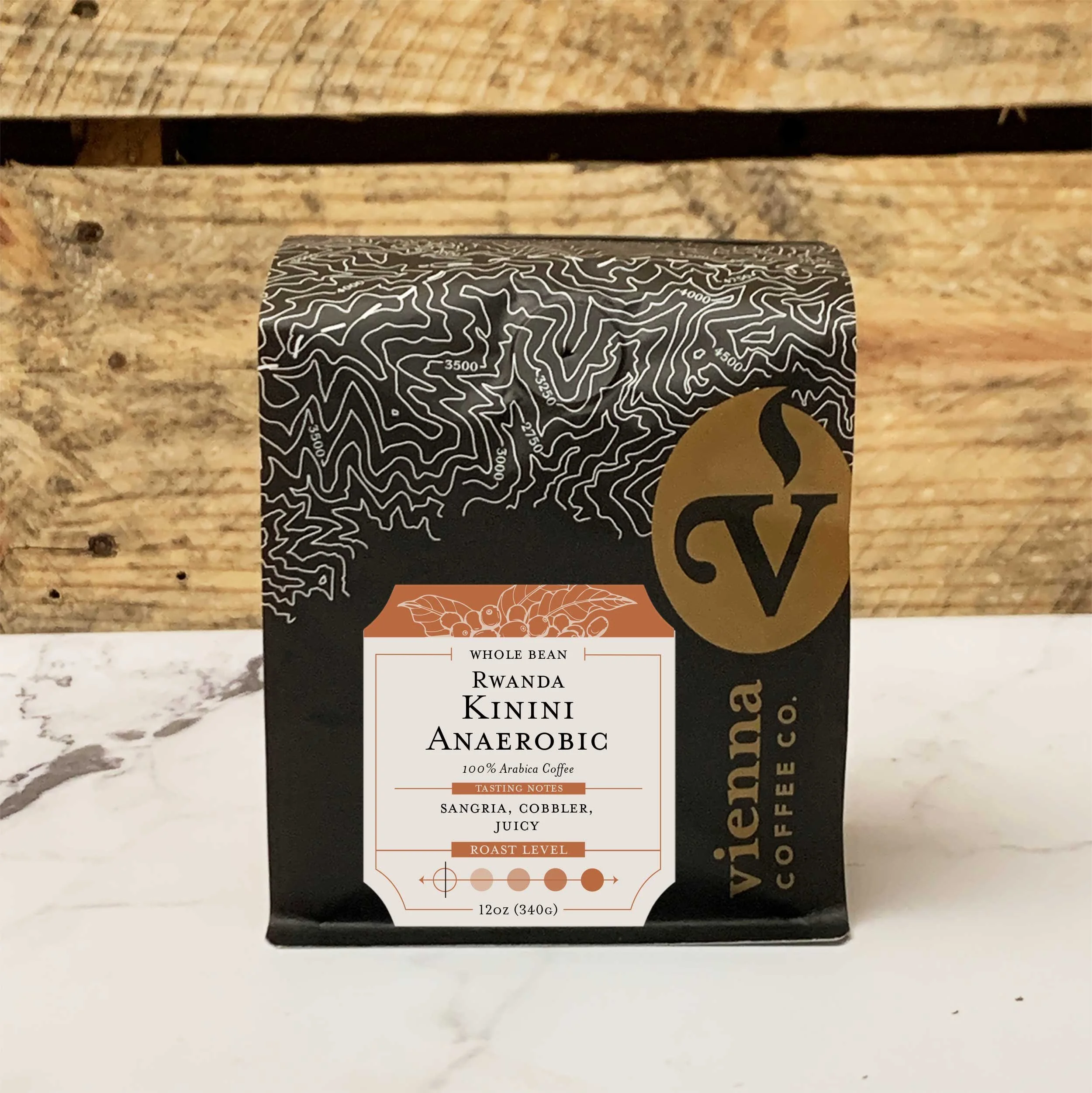 Rwanda Kinini Anaerobic Natural - coffee bag sitting on table