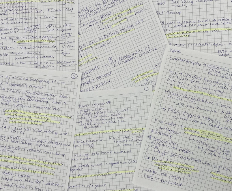 Handwritten notes on graph paper with highlighted text and annotations.