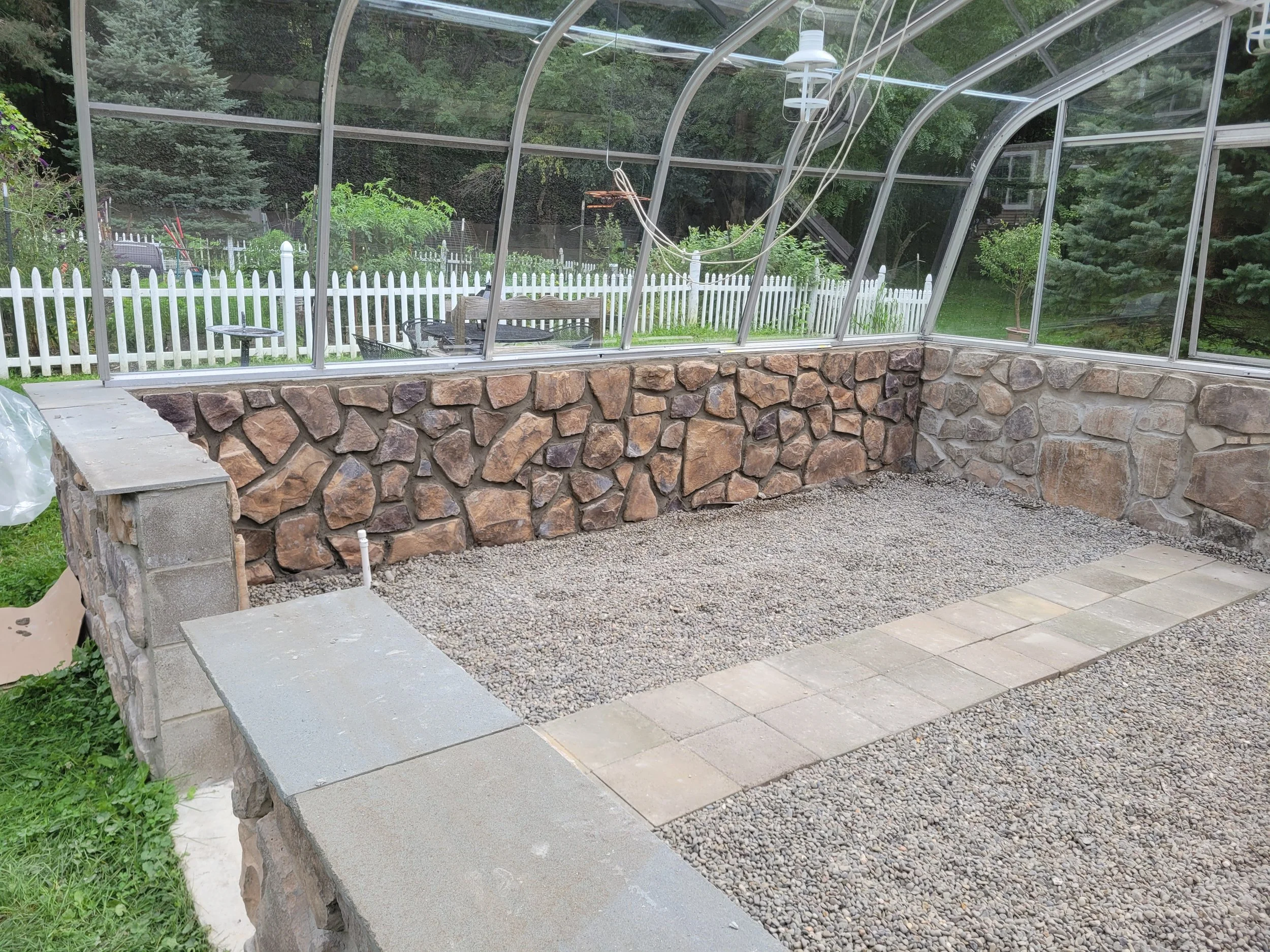 Cultured veneer stone work on a greenhouse in Orchard Park, NY.