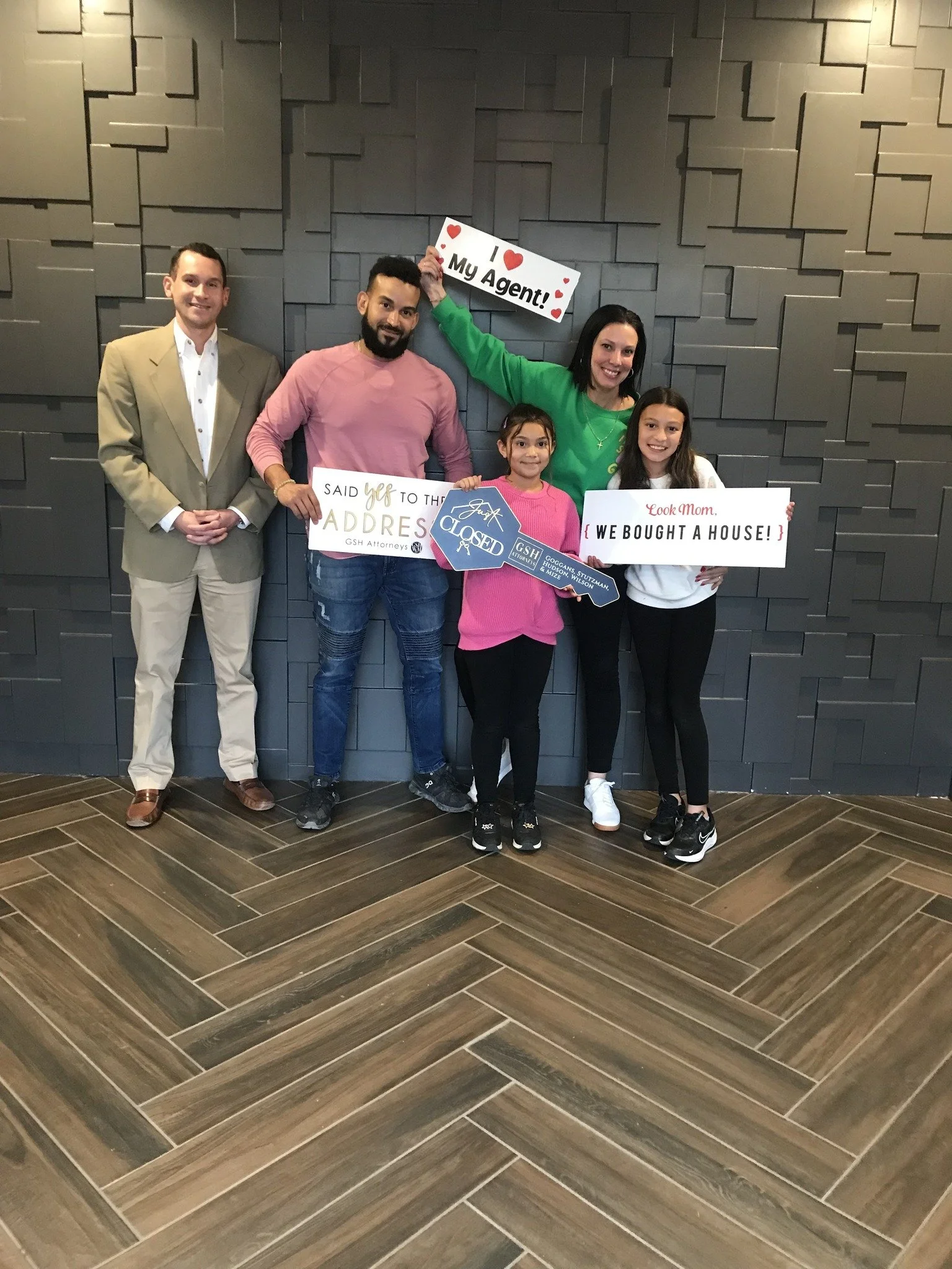 Cameran Jaques Atlanta real estate agent celebrating a successful home closing with a client