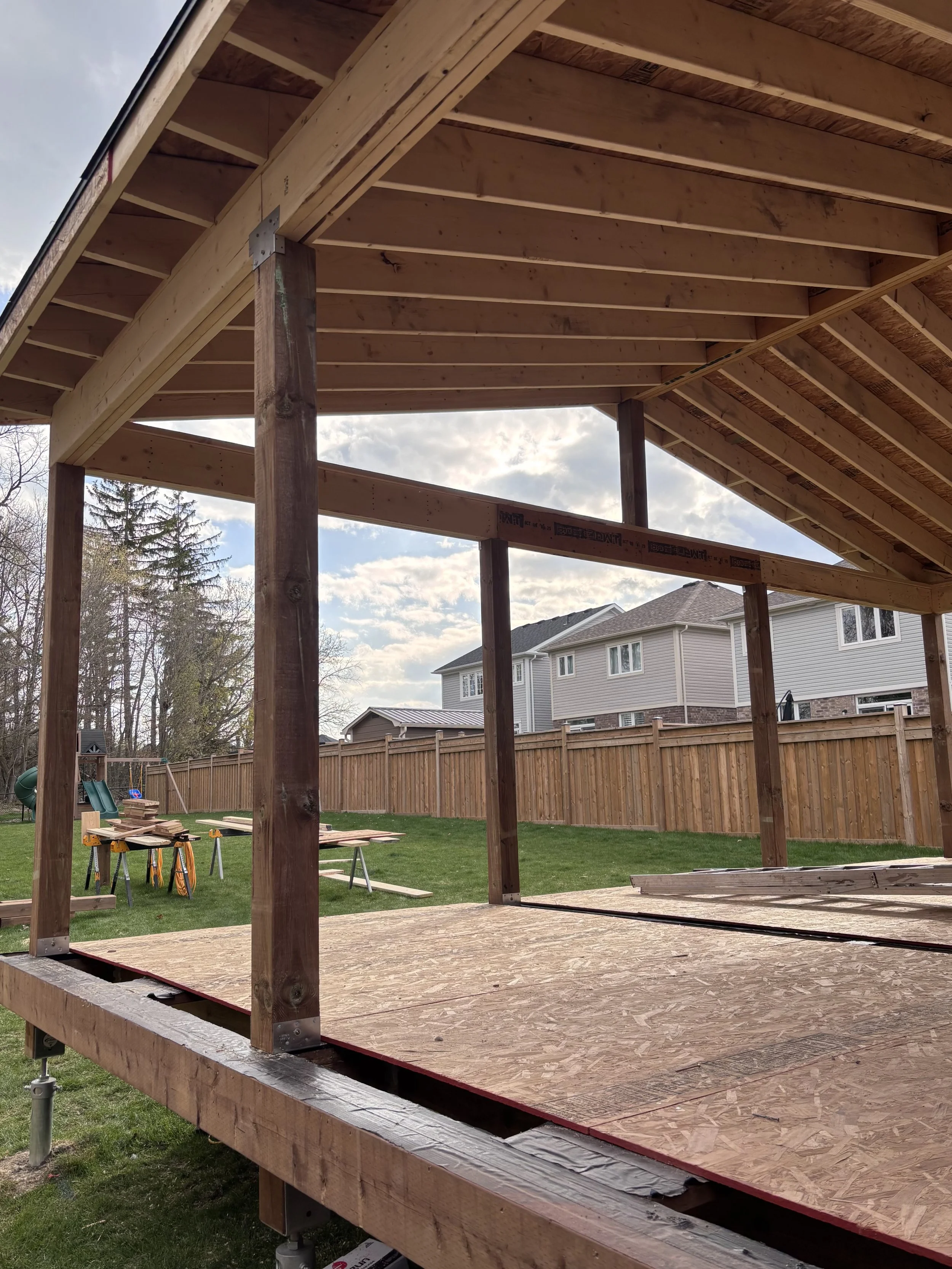 Covered deck in the framing stage on construction in Port Perry Ontario 