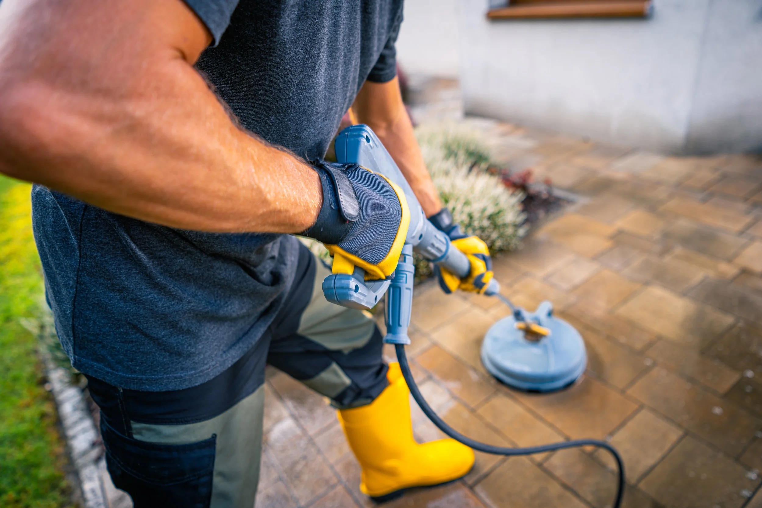 pressure-washing-patio-residential-backyard-daylight-improved-appearance-maintenance.jpg