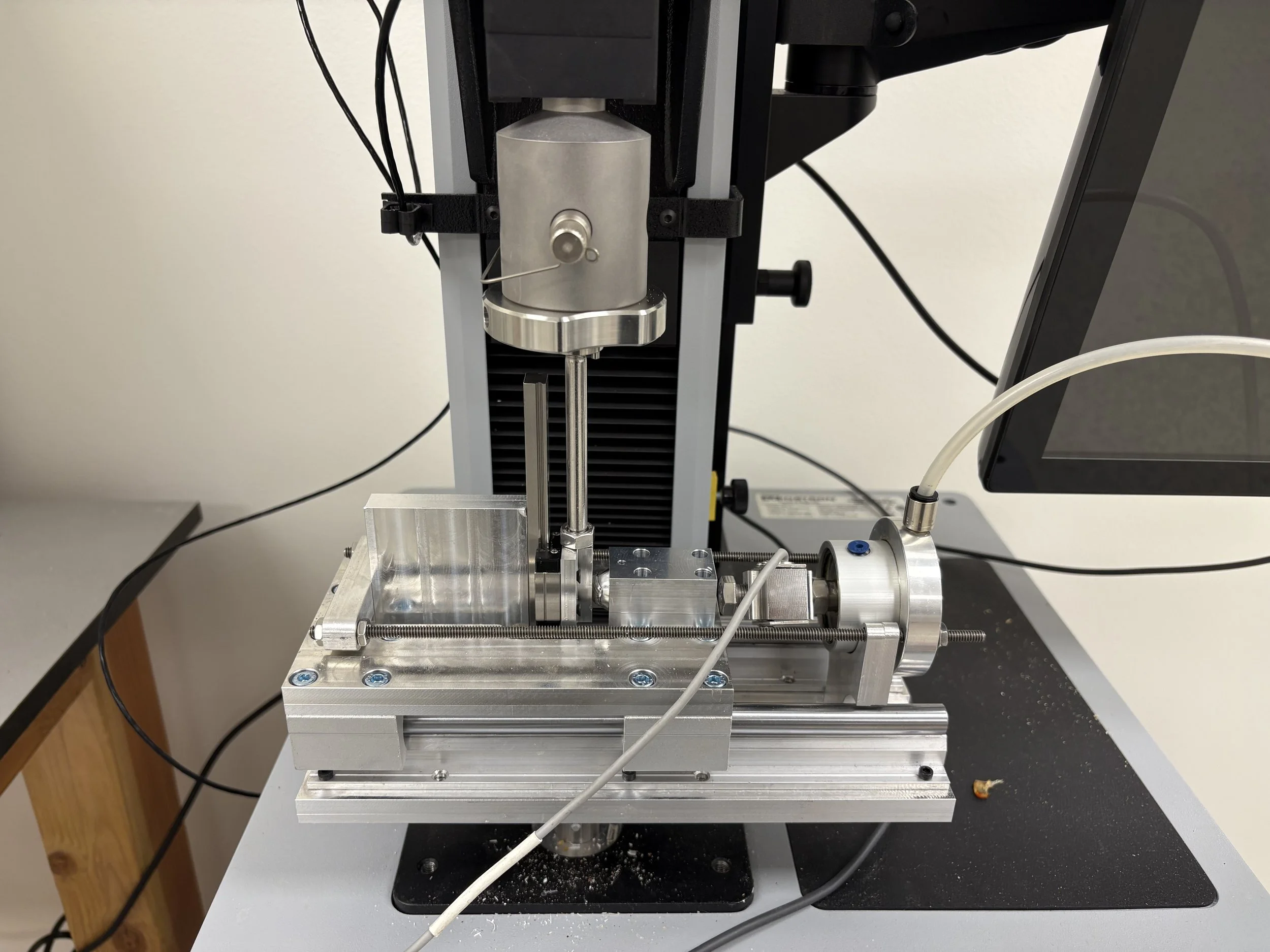 Shear test fixture integrated into a Instron Material Tester. 