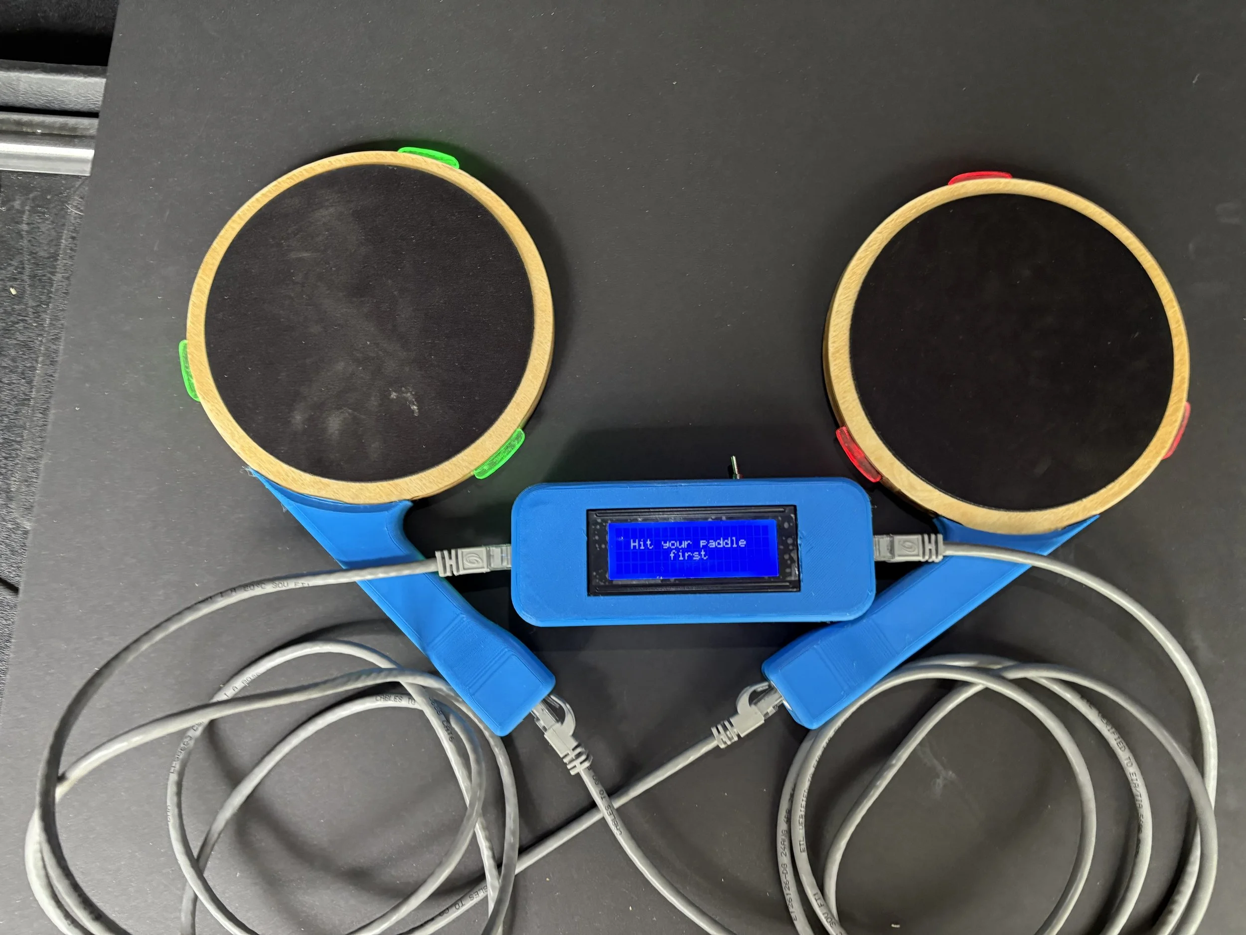 Paddle on the left was hit first and is the winner!