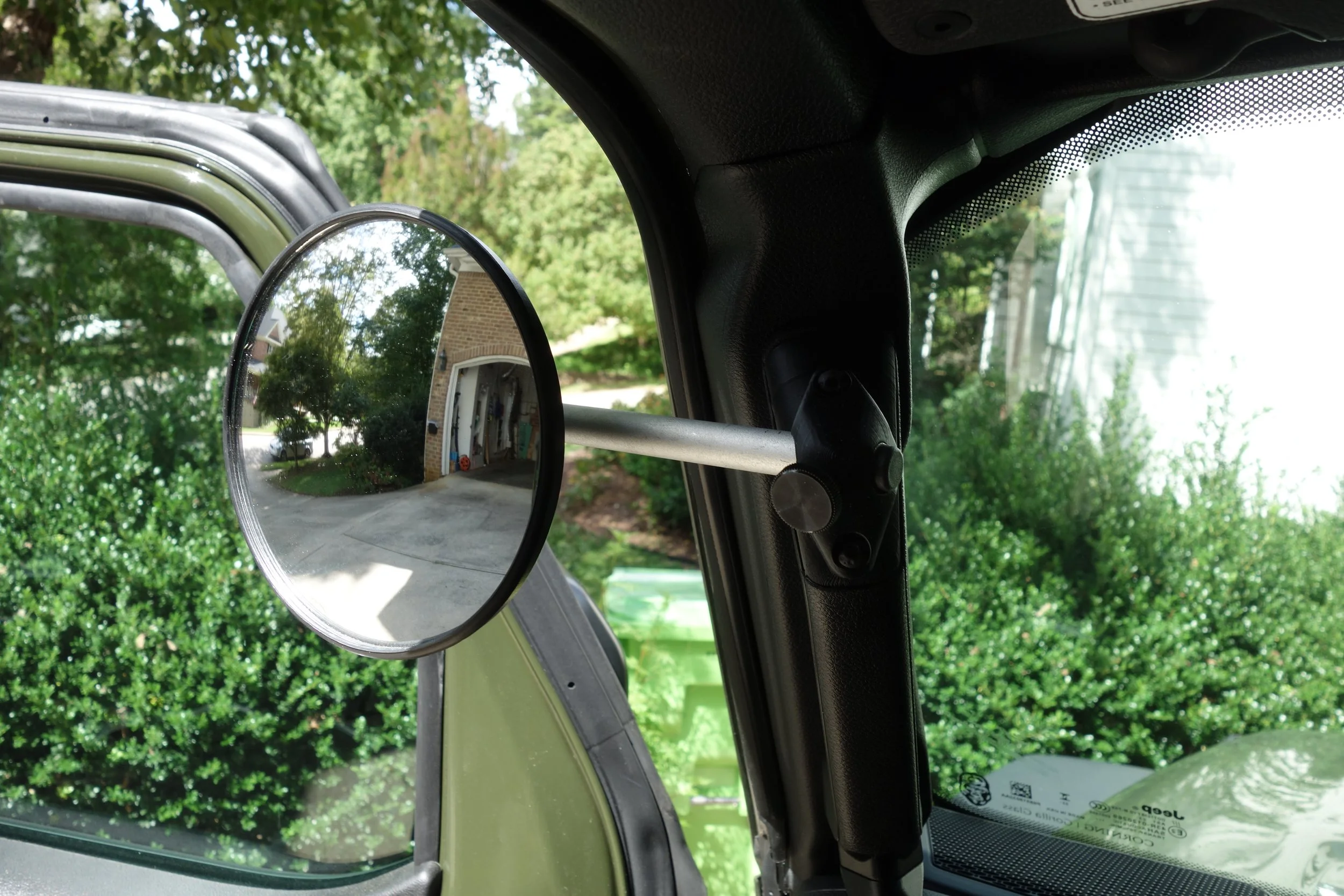 Mirror Mounted to Upper Grab Handle Cover