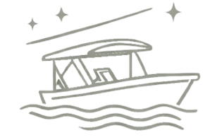 A silver catamaran boat in the water with a clear sky in the background.
