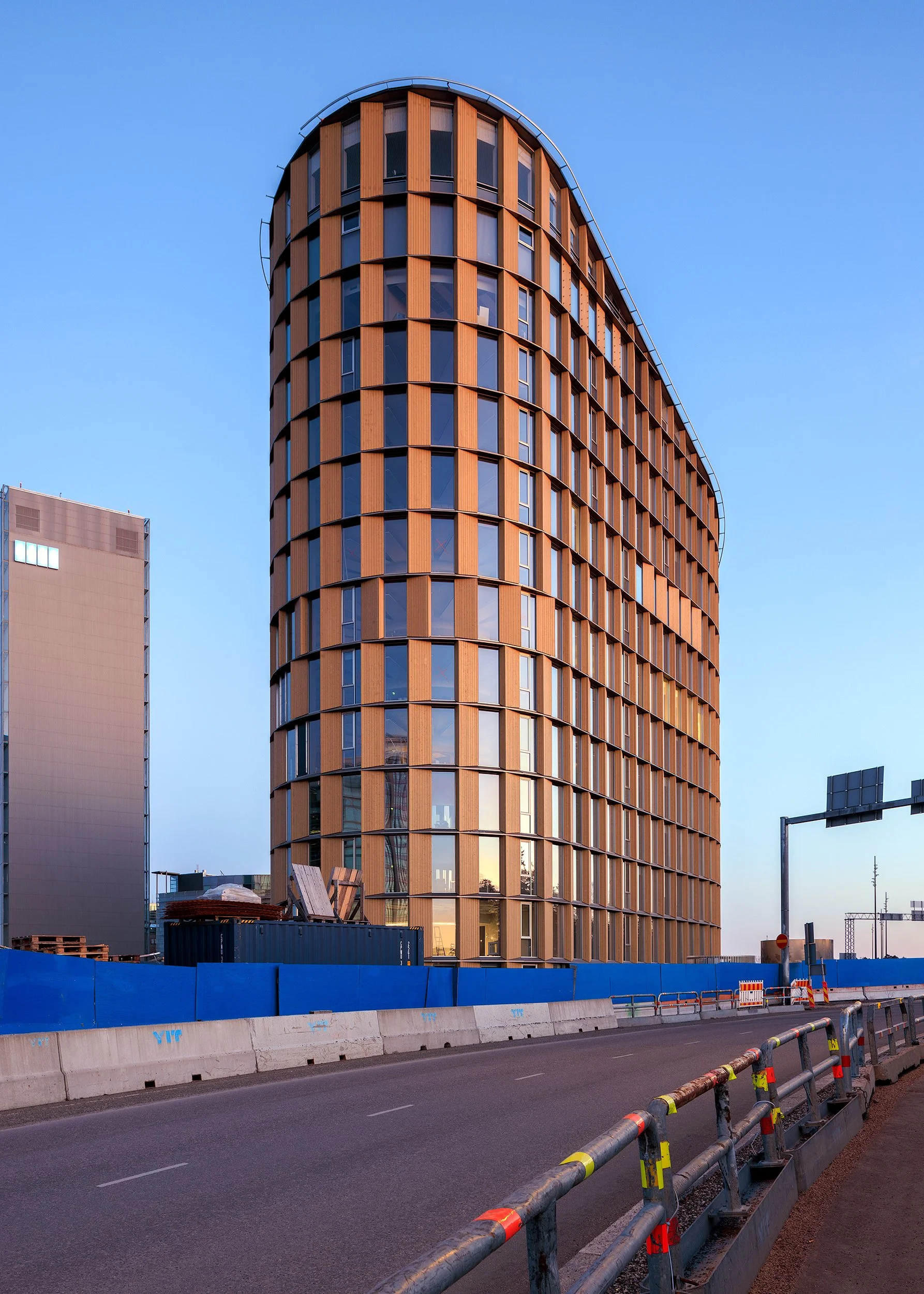 Keilaniemen Portti wooden office building site with adjacent Keilaniemi office cluster, April 2026