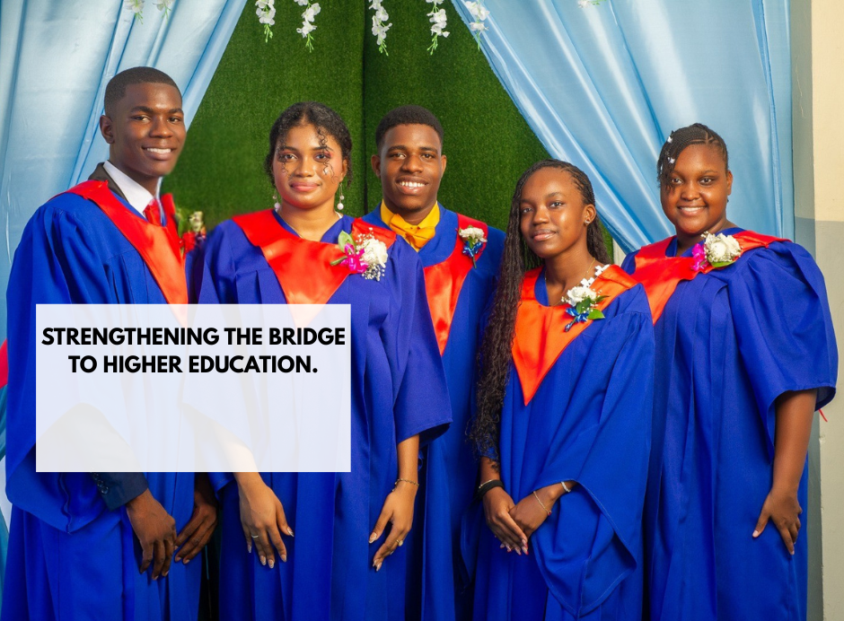 Group of five young graduates in blue caps and gowns with red and orange stoles, standing in front of a blue and green backdrop with flowers, celebrating graduation.