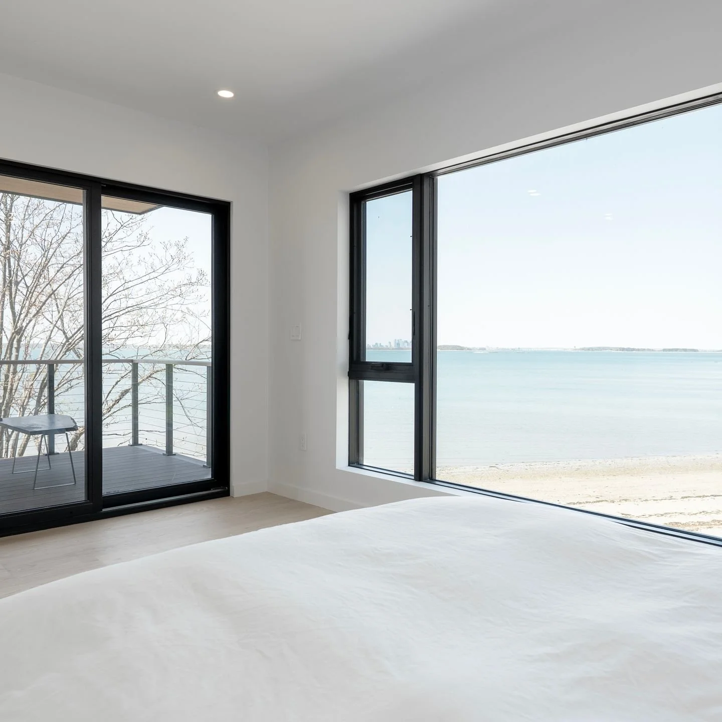 It&rsquo;s deck season ☀️ This custom home features several outdoor spaces, but our favorite has to be the private deck off the primary bedroom. Overlooking the water and made for slow mornings and sunset views.

Builder: @trudesignbuild
Architect: @