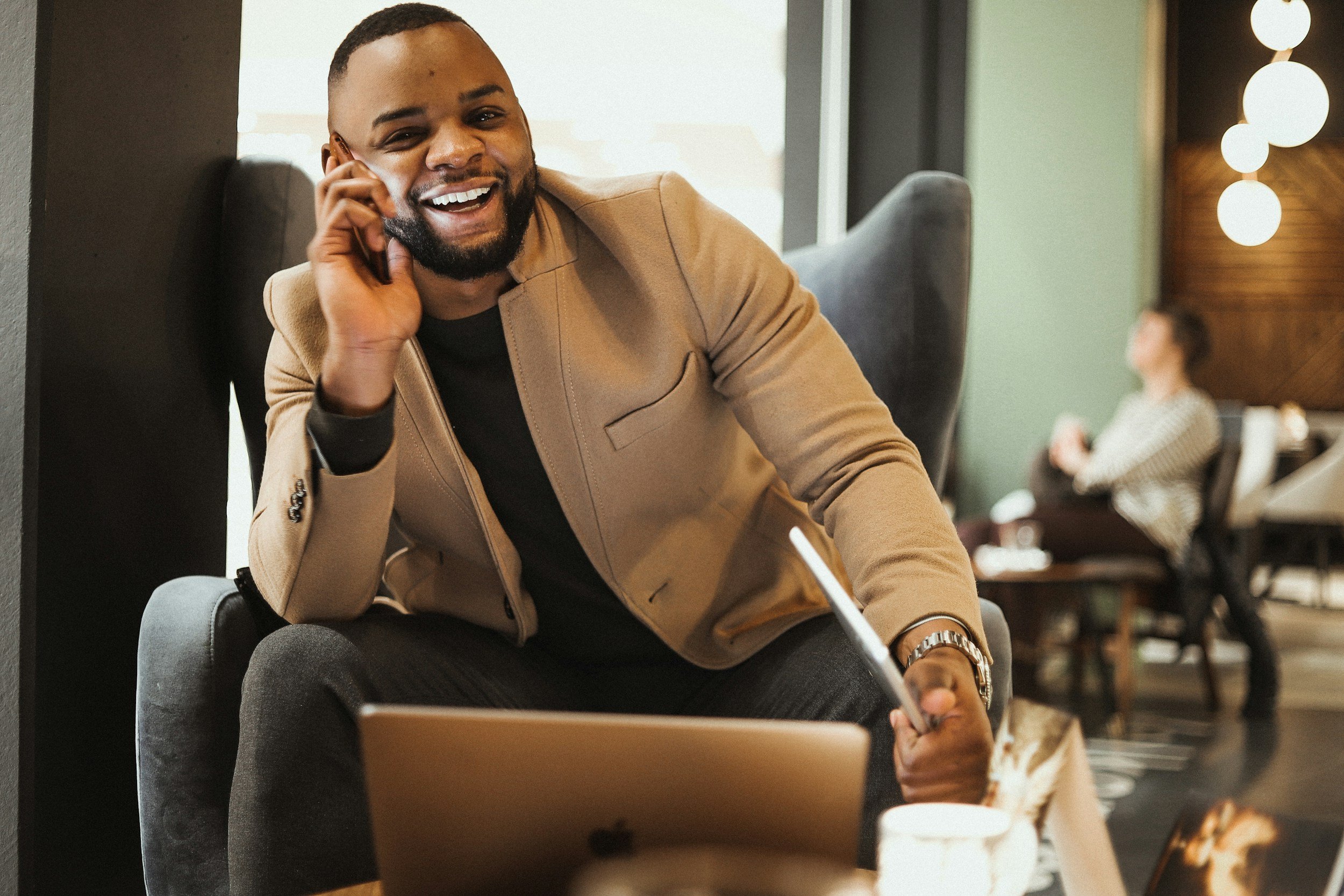 Black male professional in a consultation moment, linking to the About page and the clinical philosophy underneath the supervision and consultation work