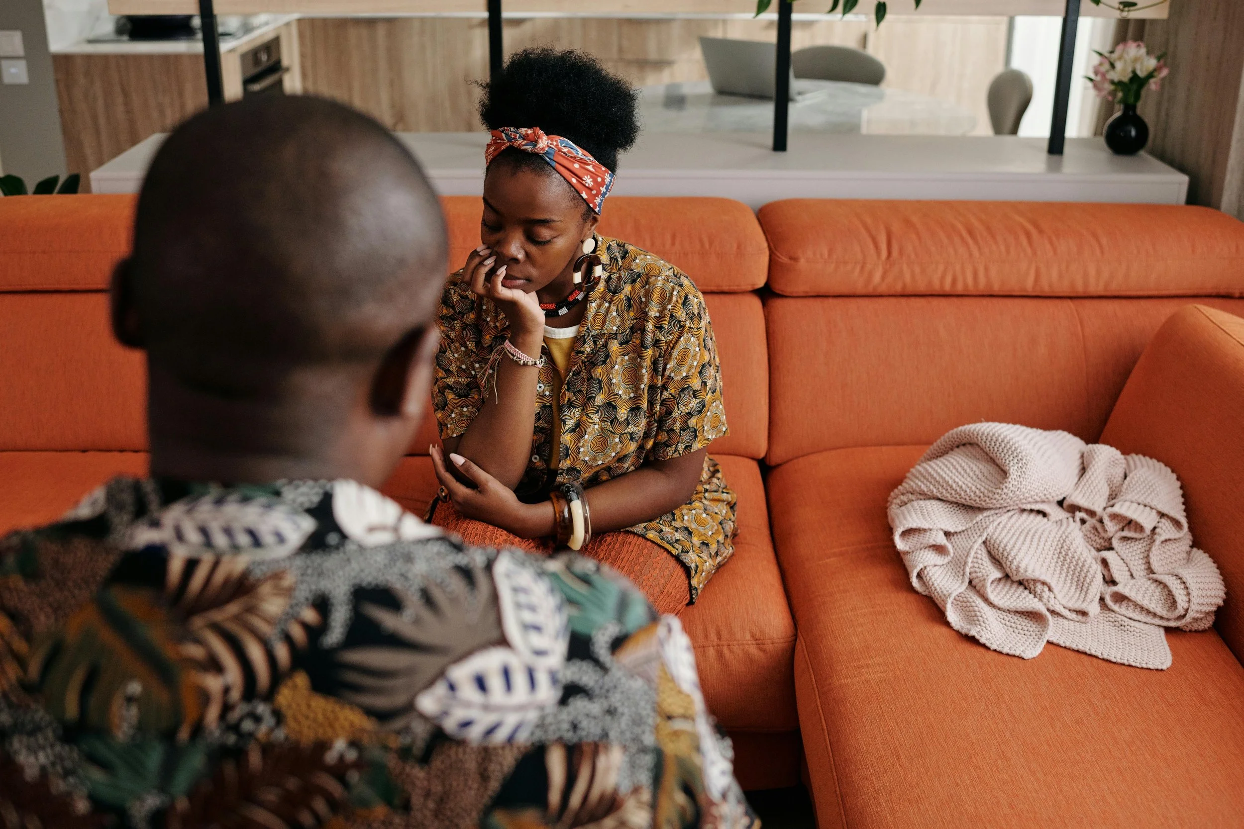 Black couple in a tender, quiet moment together, representing the trauma-informed couples therapy at Healthy Mind, Healthy Heart that reaches what conversation alone can't