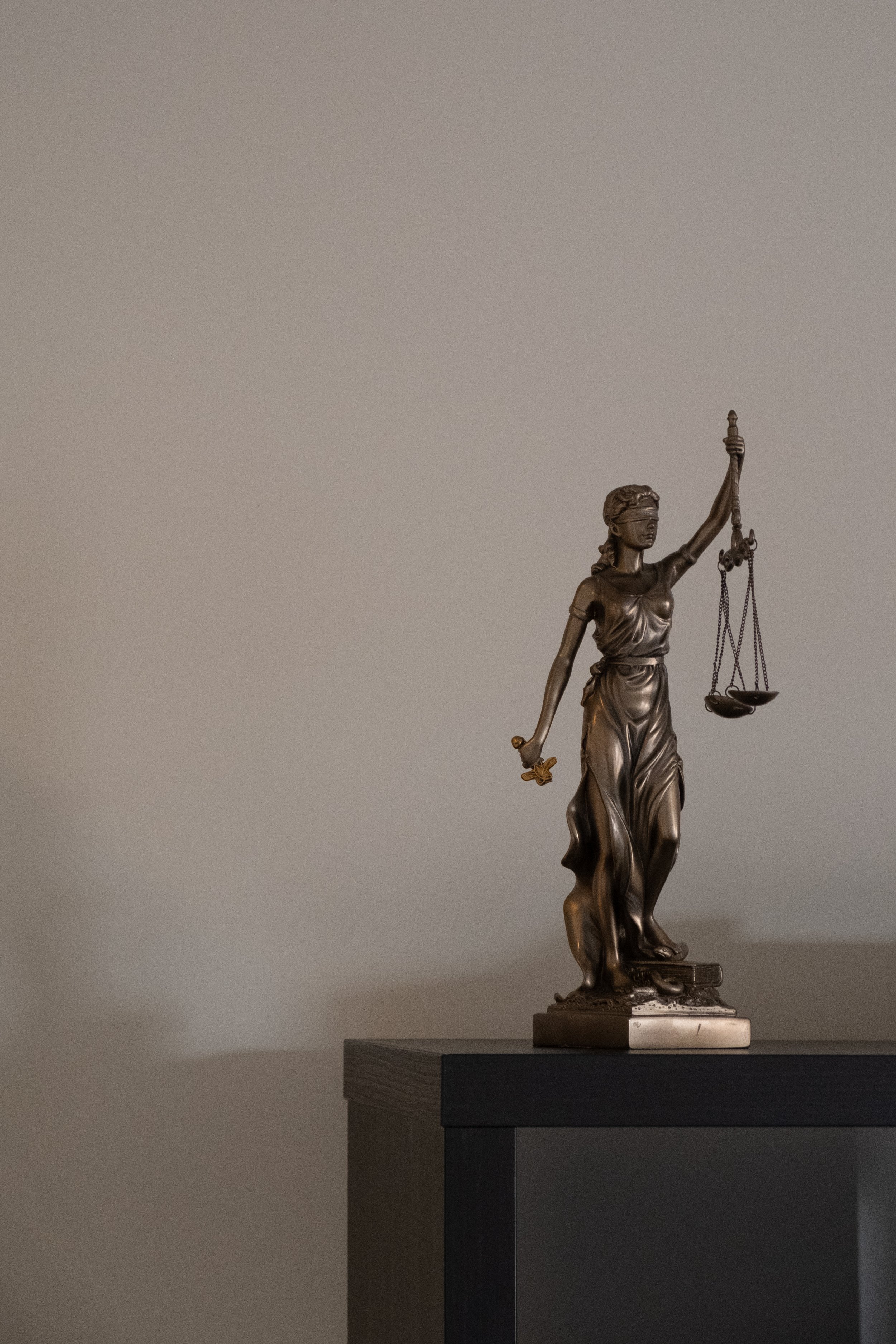 Statut représentant la justice