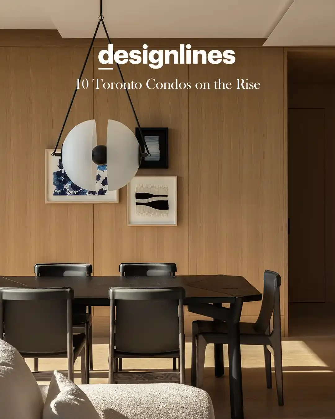 Dining room with wooden wall, black table, six black chairs, abstract art, and a modern pendant lamp. Cover story titled 'designetlines: 10 Toronto Condos on the Rise.'