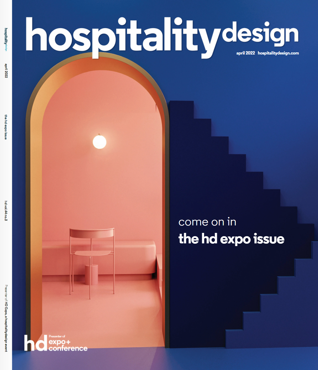 Cover of Hospitality Design magazine, April 2022 issue, featuring a pink interior space viewed through an arched doorway with a hanging light and a simple pink chair, with blue stairs on the right side and text inviting to the HD Expo event.