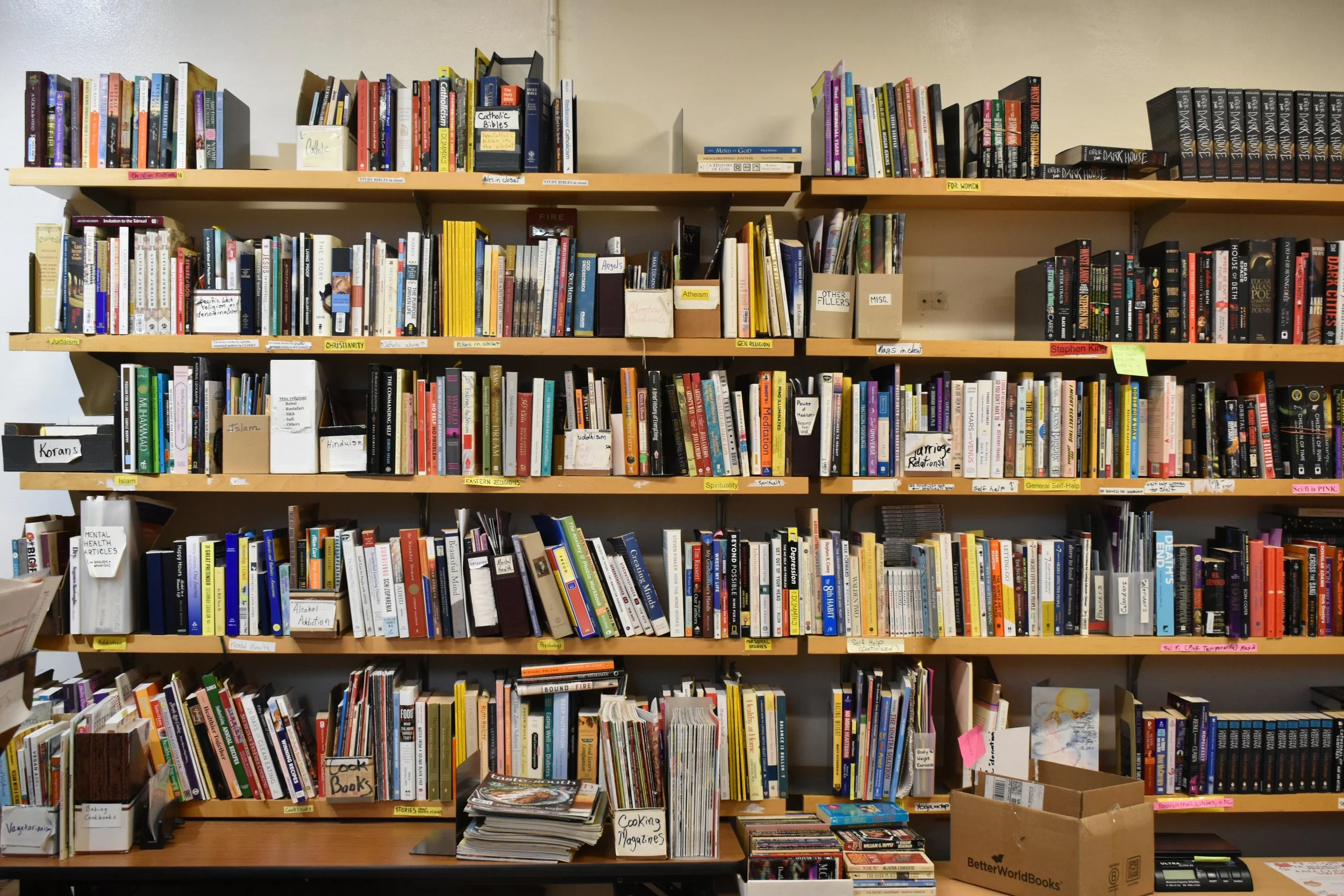 Books on a bookshelf at DC Books to Prisons.