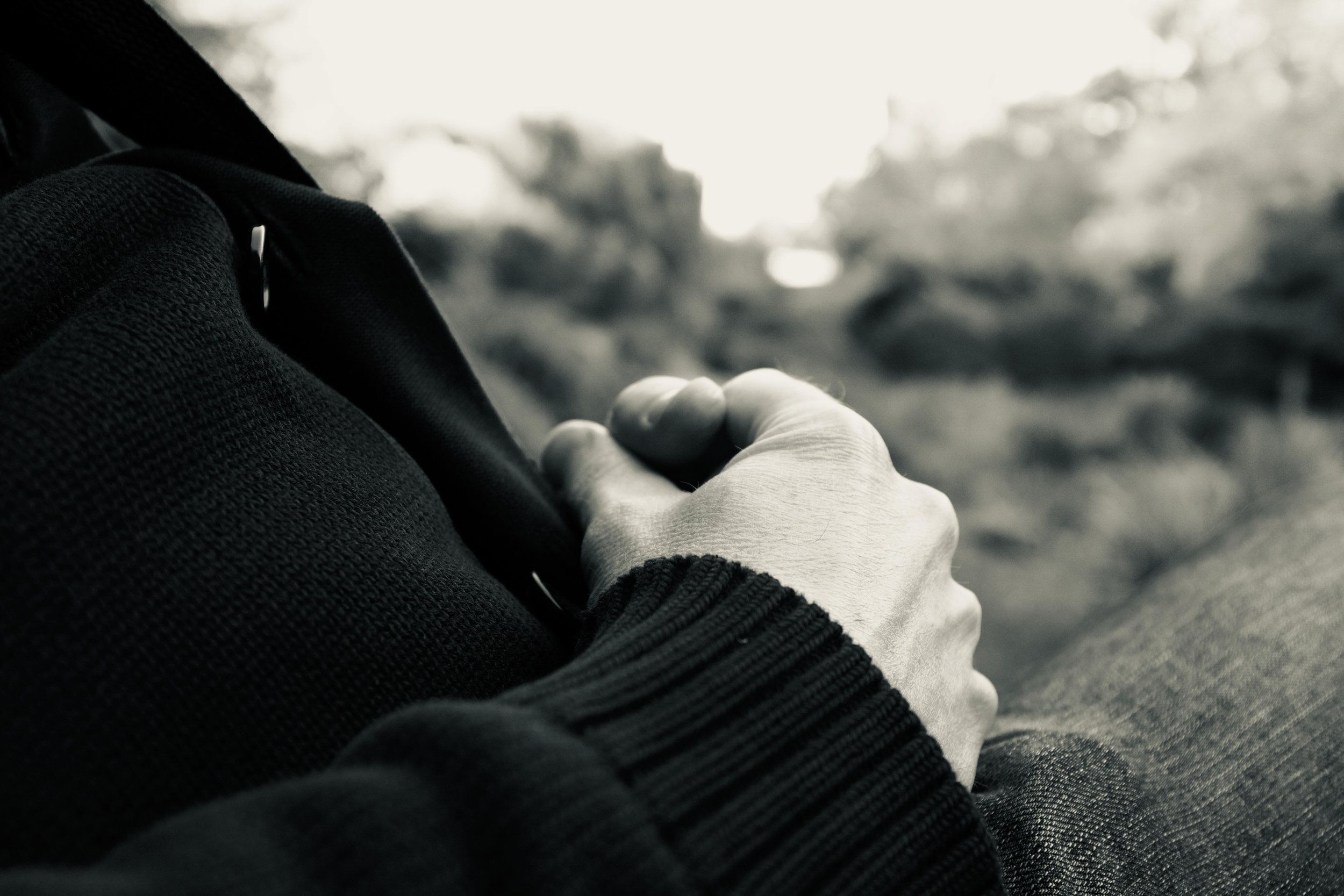 Portrait Photography by Matt Kollander - Wise and thoughtful hands resting in the park