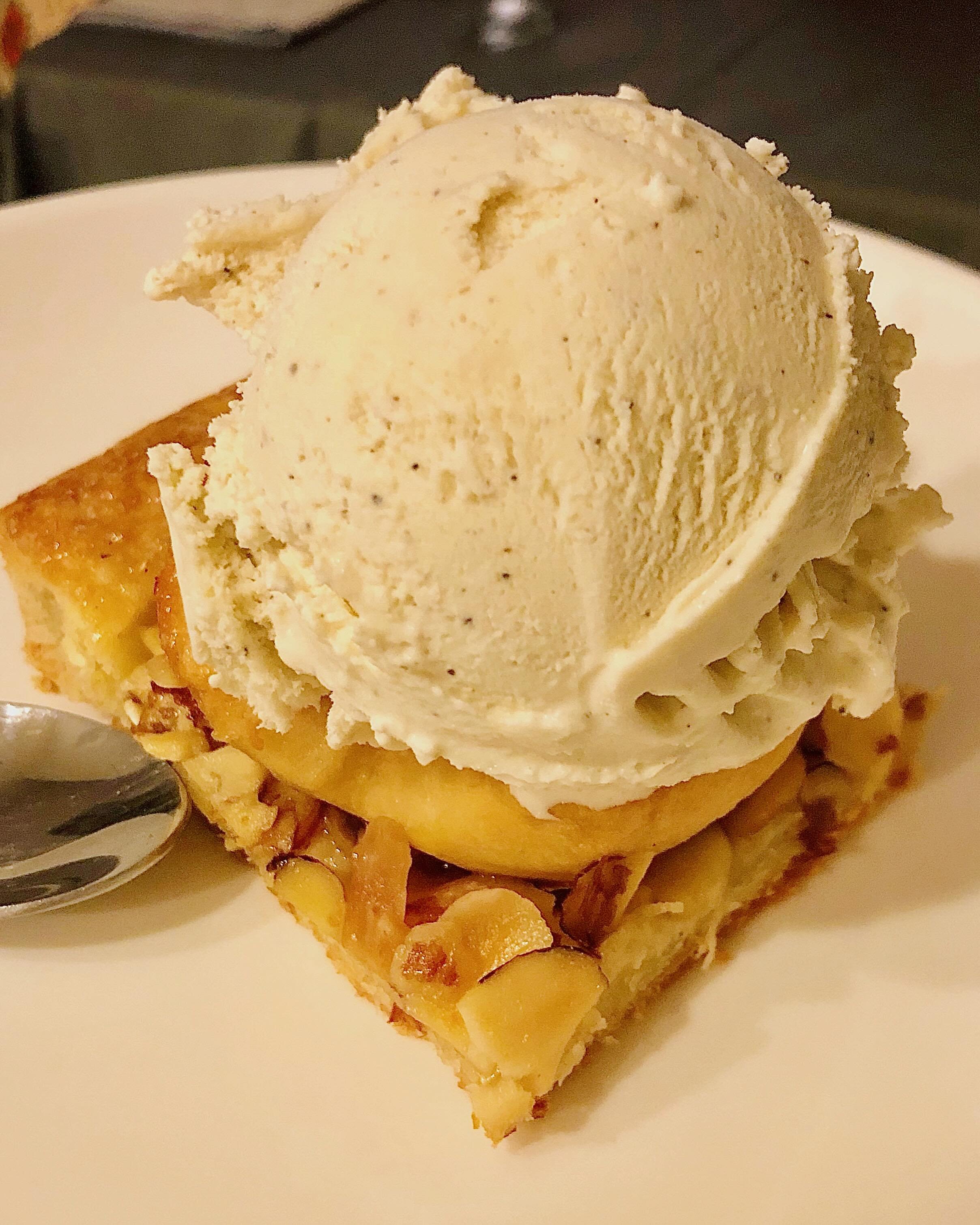 Rough puff apple pie topped with fresh vanilla bean ice cream - home cooking and food photography by Matt Kollander