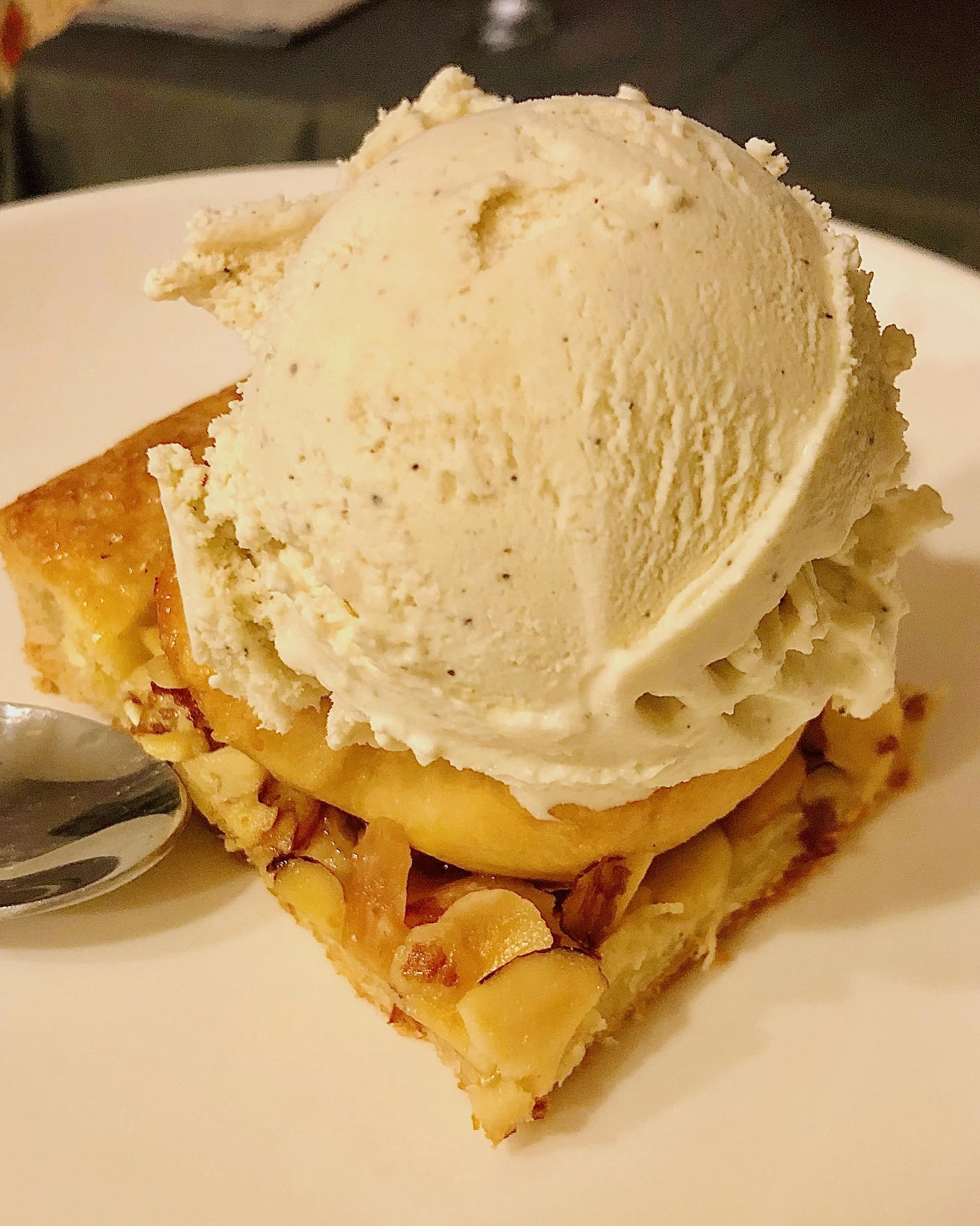 Rough puff apple pie topped with fresh vanilla bean ice cream - home cooking and food photography by Matt Kollander