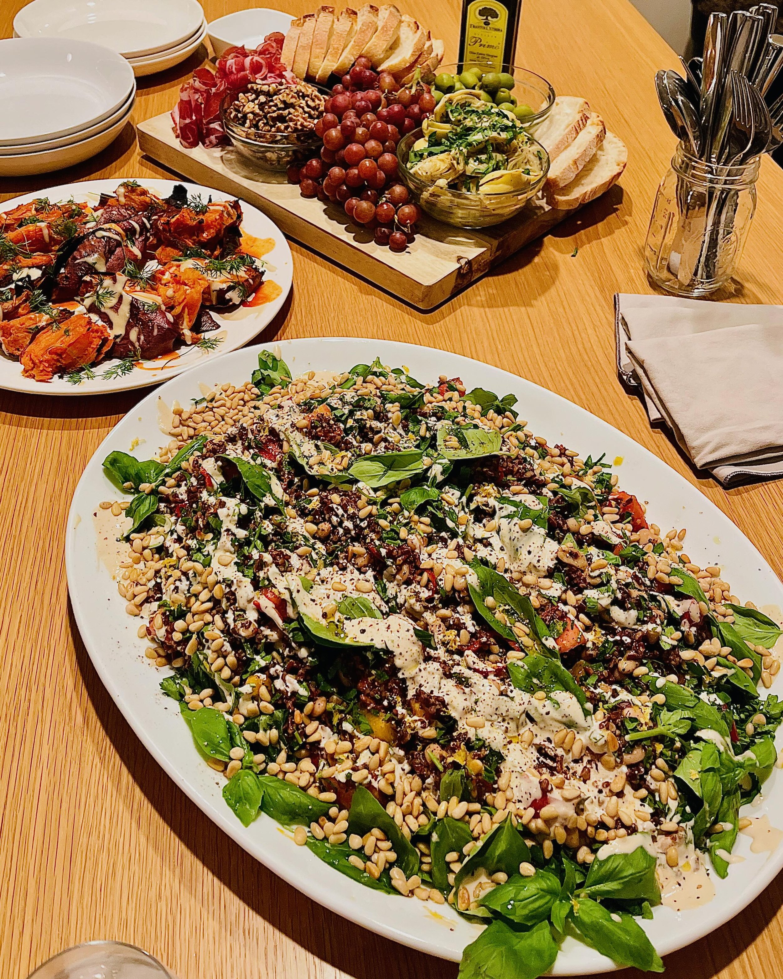 Farro salad, roast sweet potatoes with tahina dressing, and a vegetarian charcuterie board - home cooking and food photography by Matt Kollander