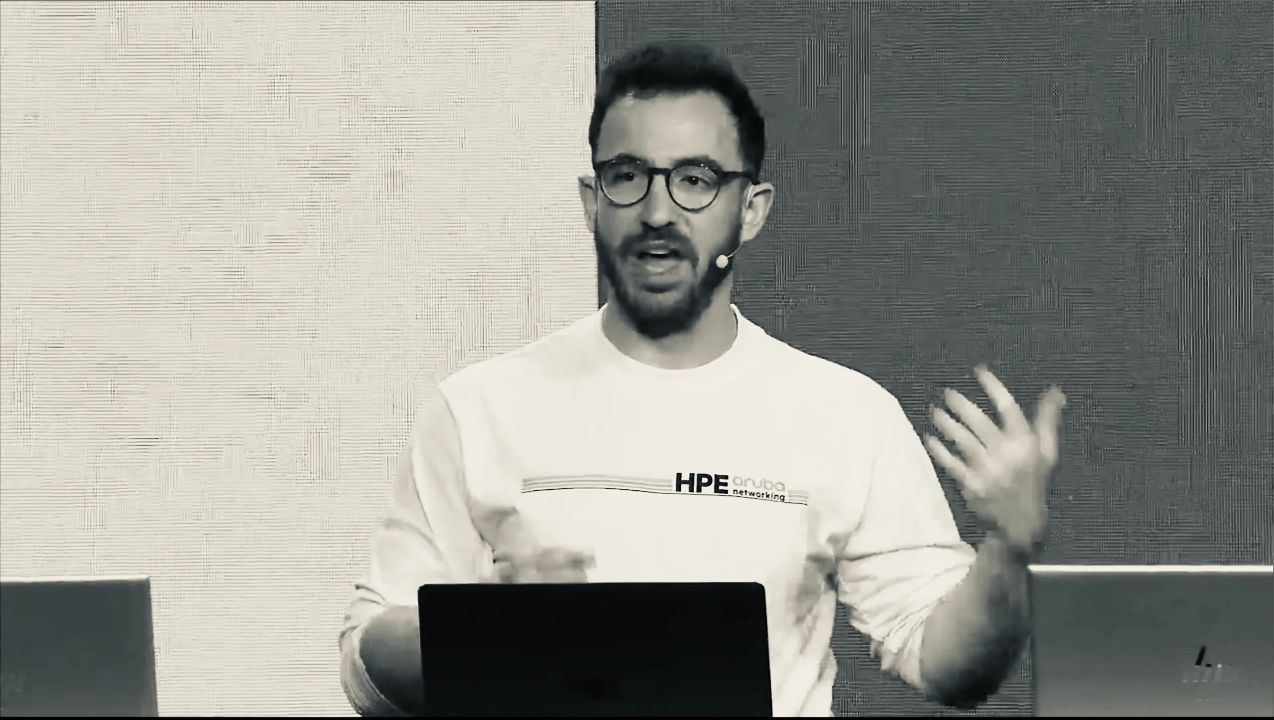 Matt Kollander presenting at a technology conference keynote