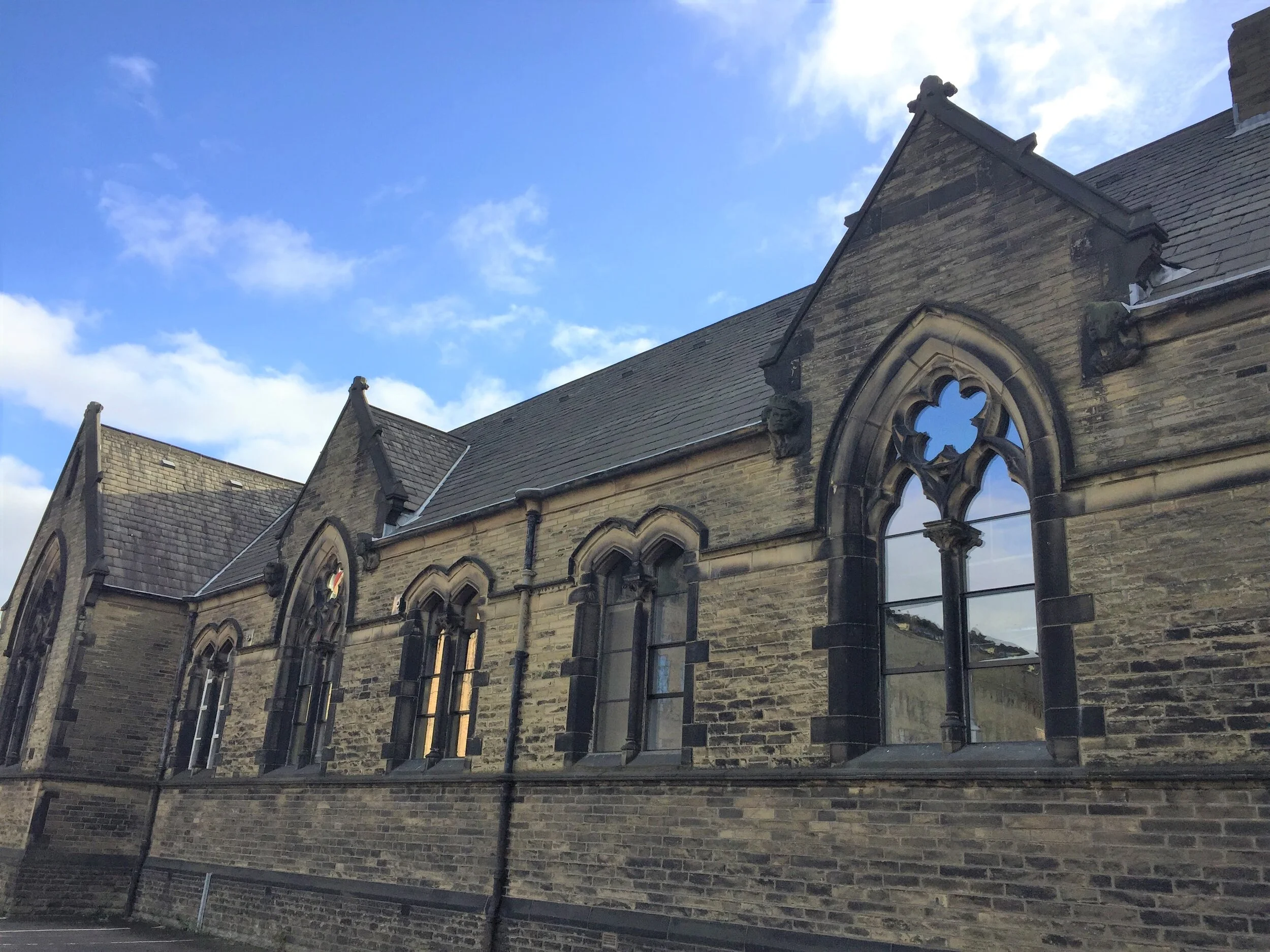 Shaped double glazed windows for a school