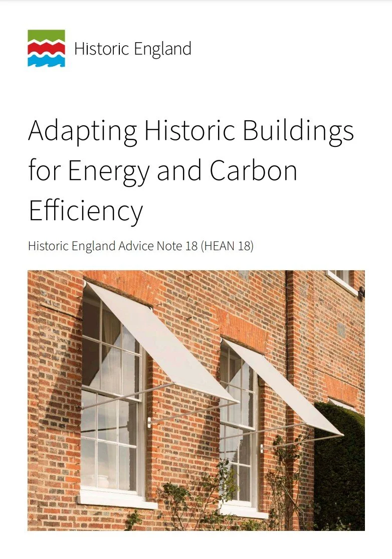 Cover page of a report titled "Adapting Historic Buildings for Energy and Carbon Efficiency" by Historic England, with an image of a brick building with white window awnings.