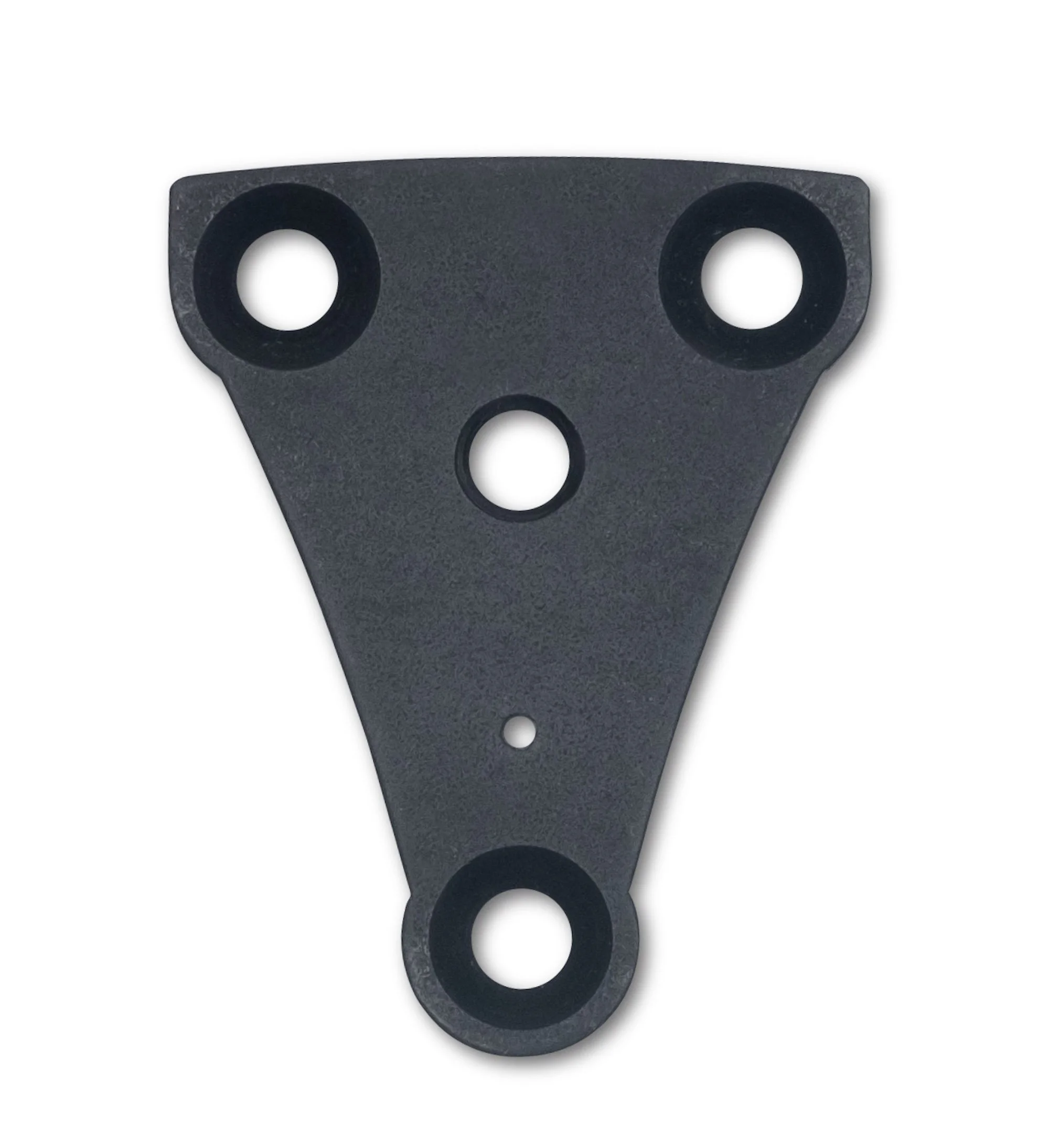 A black plastic part with four large circular holes, one smaller hole, and a curved shape, possibly a mounting bracket or spacer.