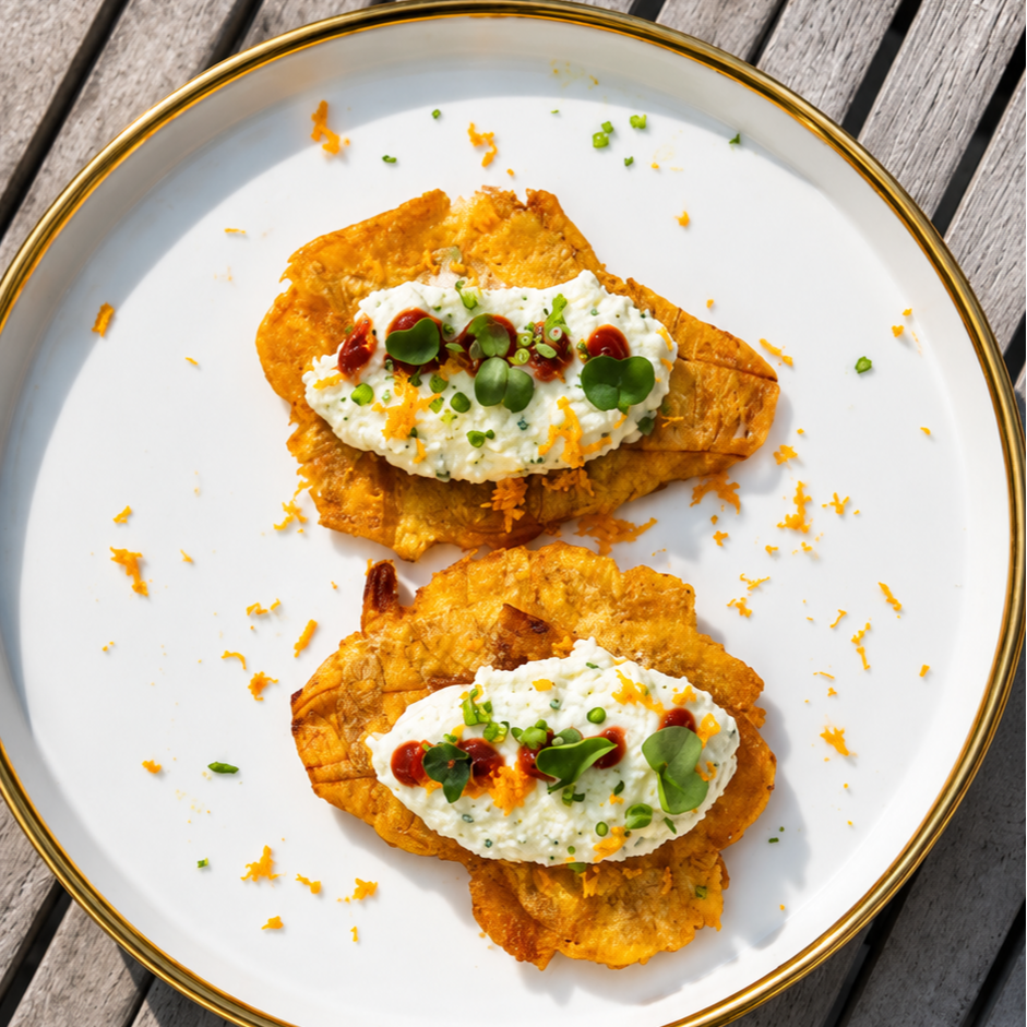 Crispy tostones, whipped ricotta, guava reduction, orange zest, and lemon oil.