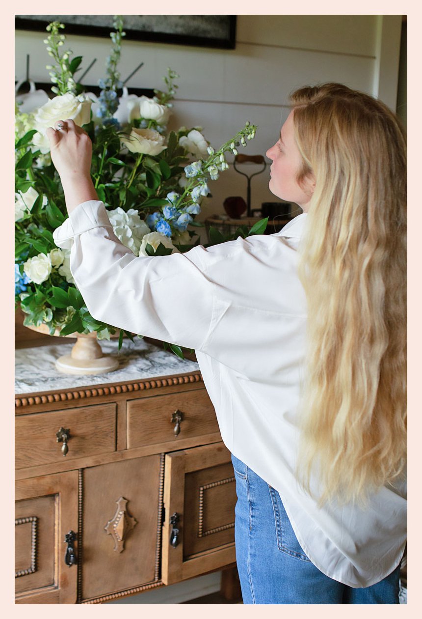 Florist in Alexandria, LA arranging custom bouquet.