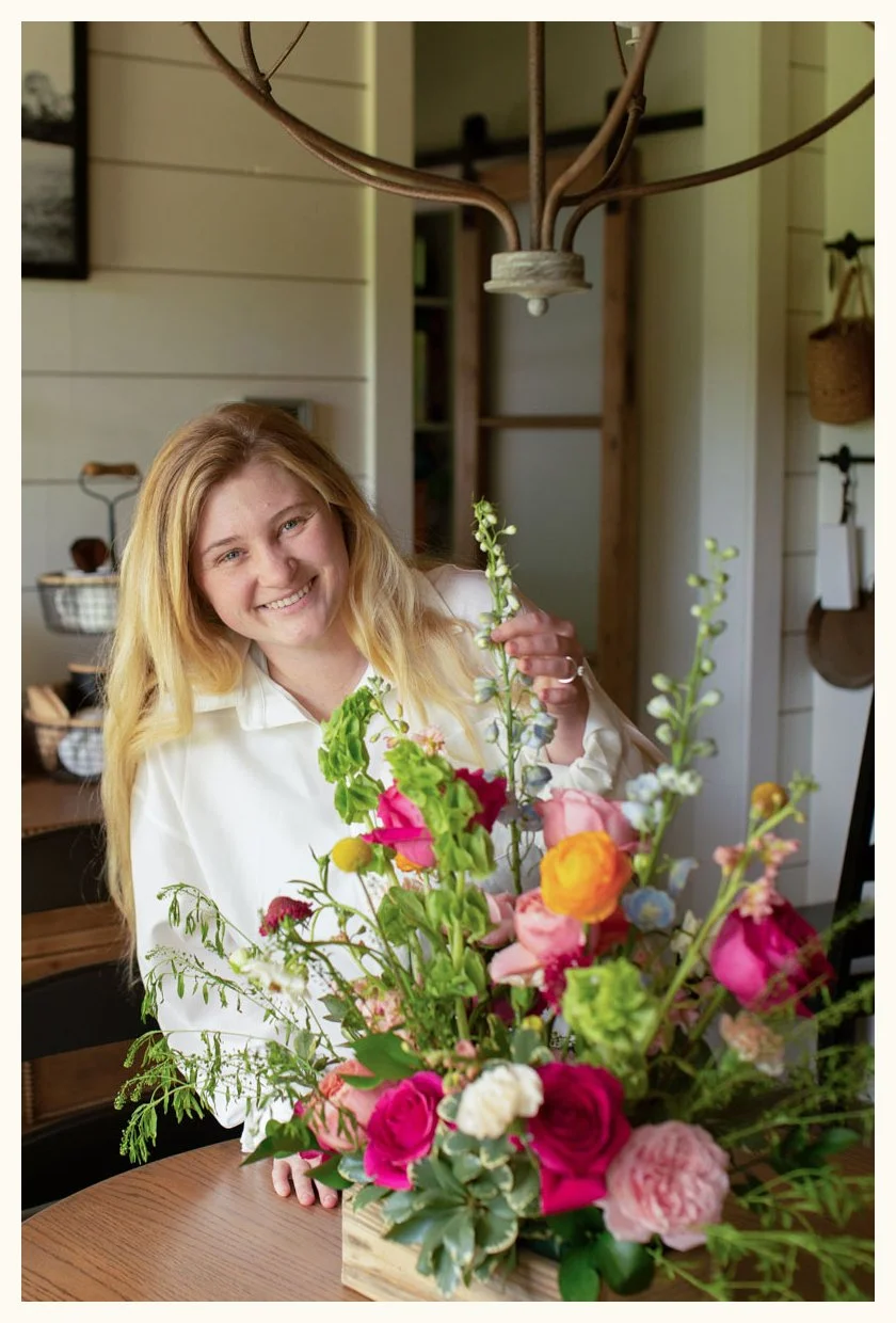 Local Alexandria, Louisiana florist designing a custom bouquet with pinks and oranges.