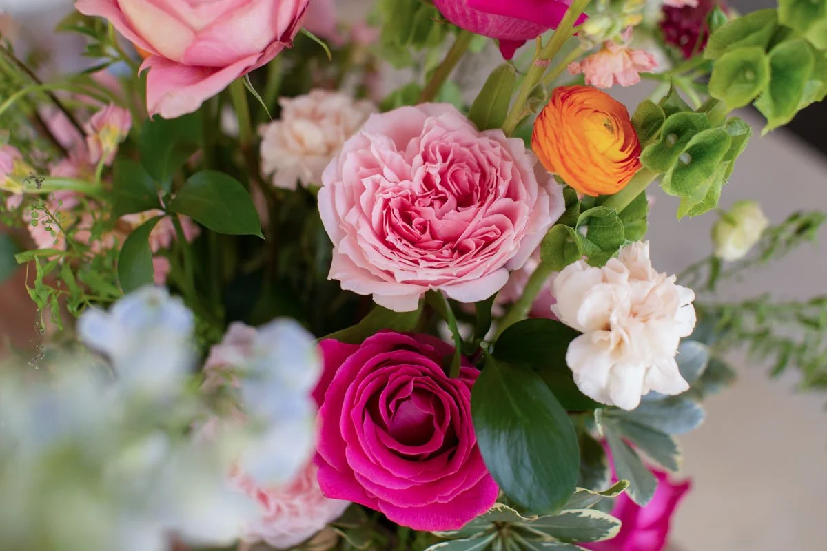 A variety of pink flowers in a bouquet at the Bouquet bar rental in Alexandria Louisiana.