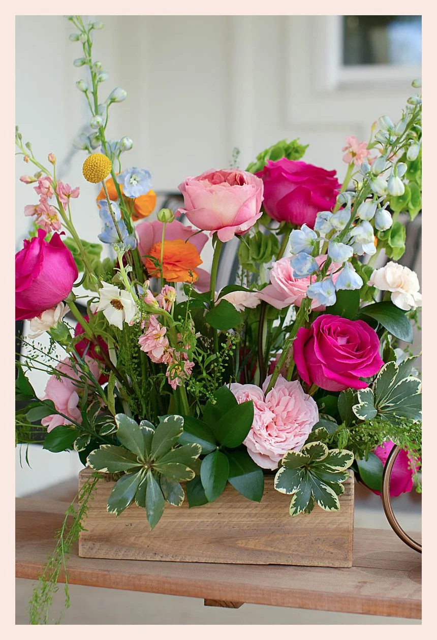 Fresh cut flowers arranged in a box from flower shop in Alexandria, LA.