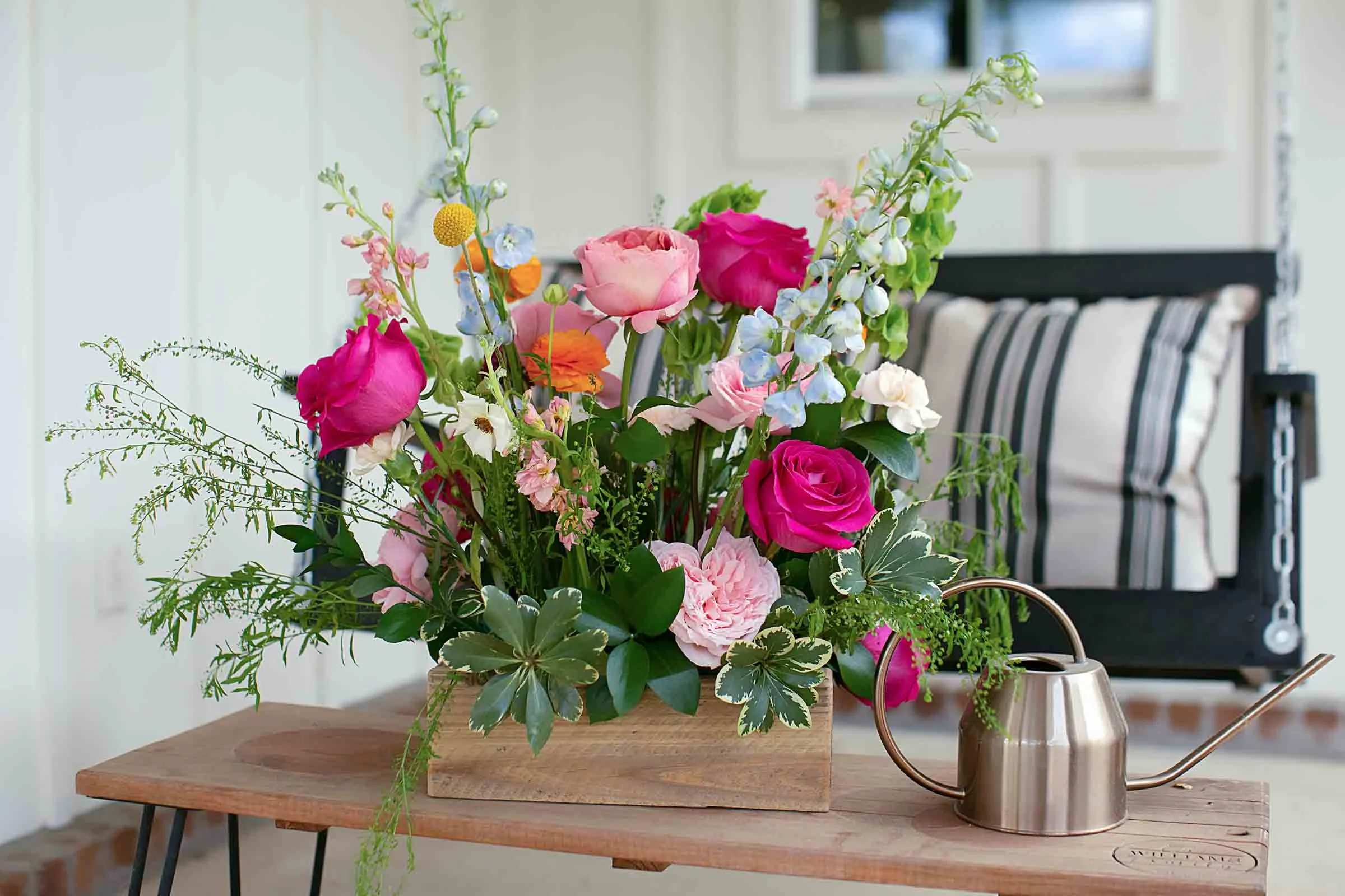 Colorful floral arrangement on a wooden table in central Louisiana.