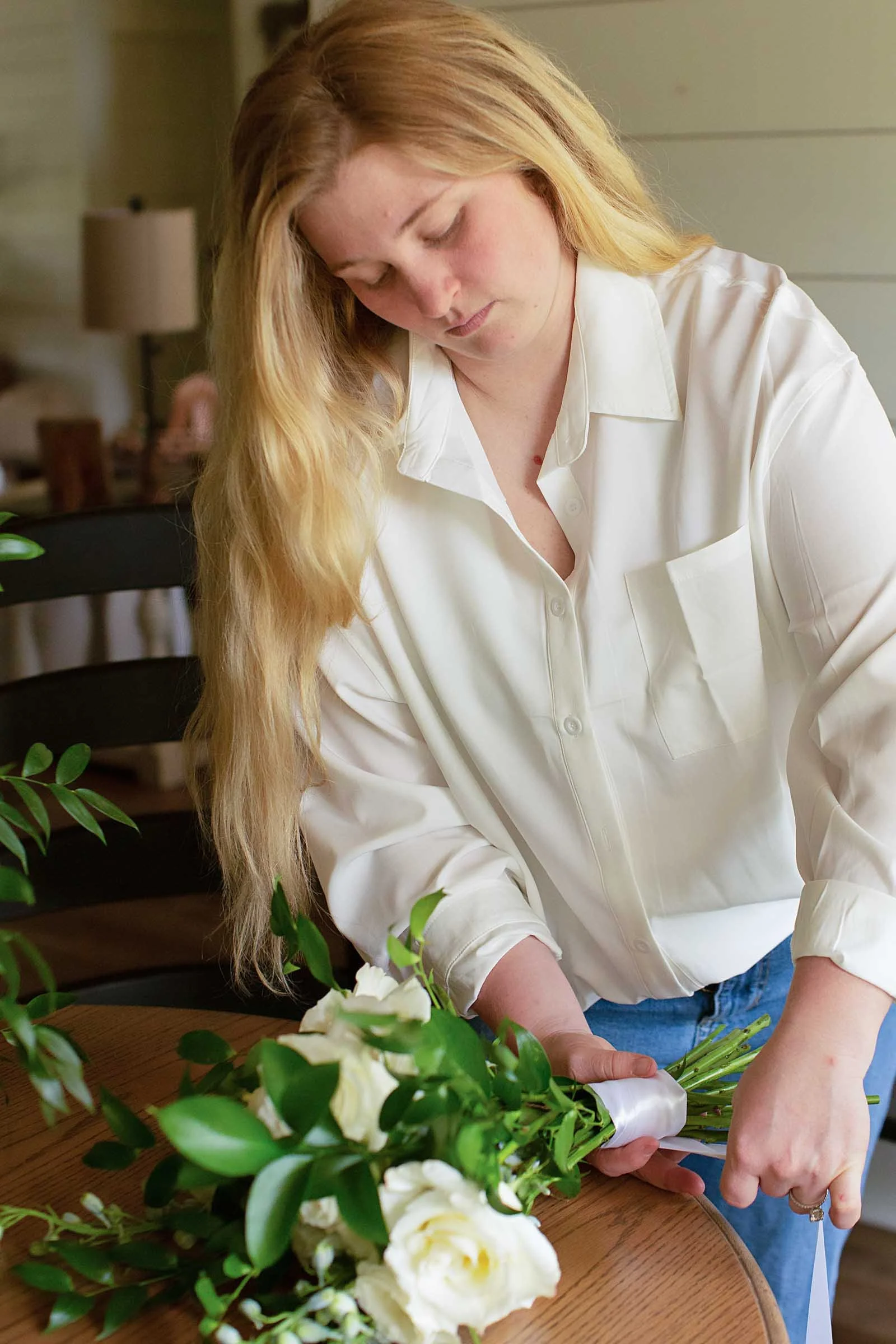 Alexandria, Louisiana florist arranging fresh seasonal flowers.