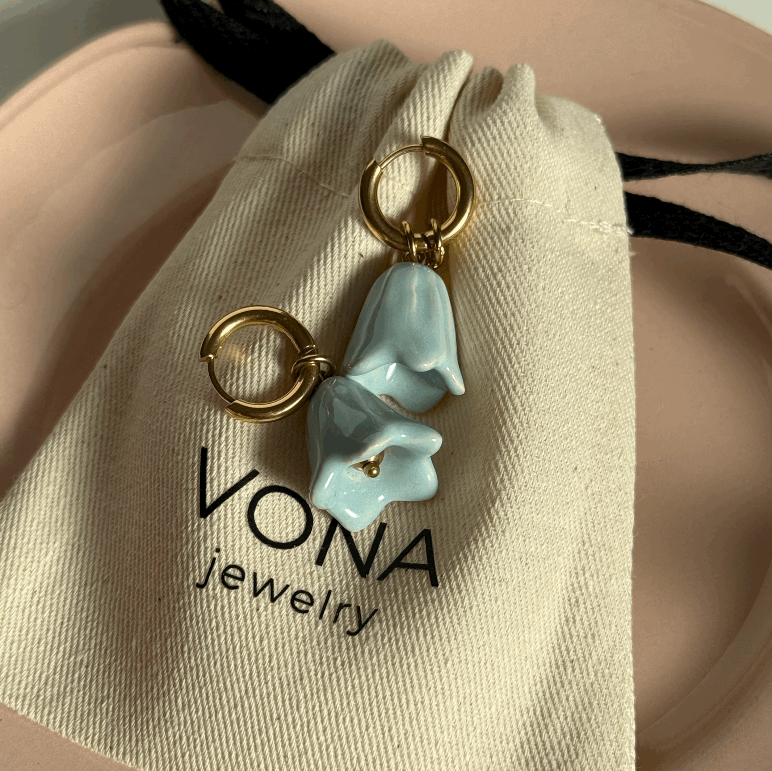 Luma Bell Drops light blue (golden)