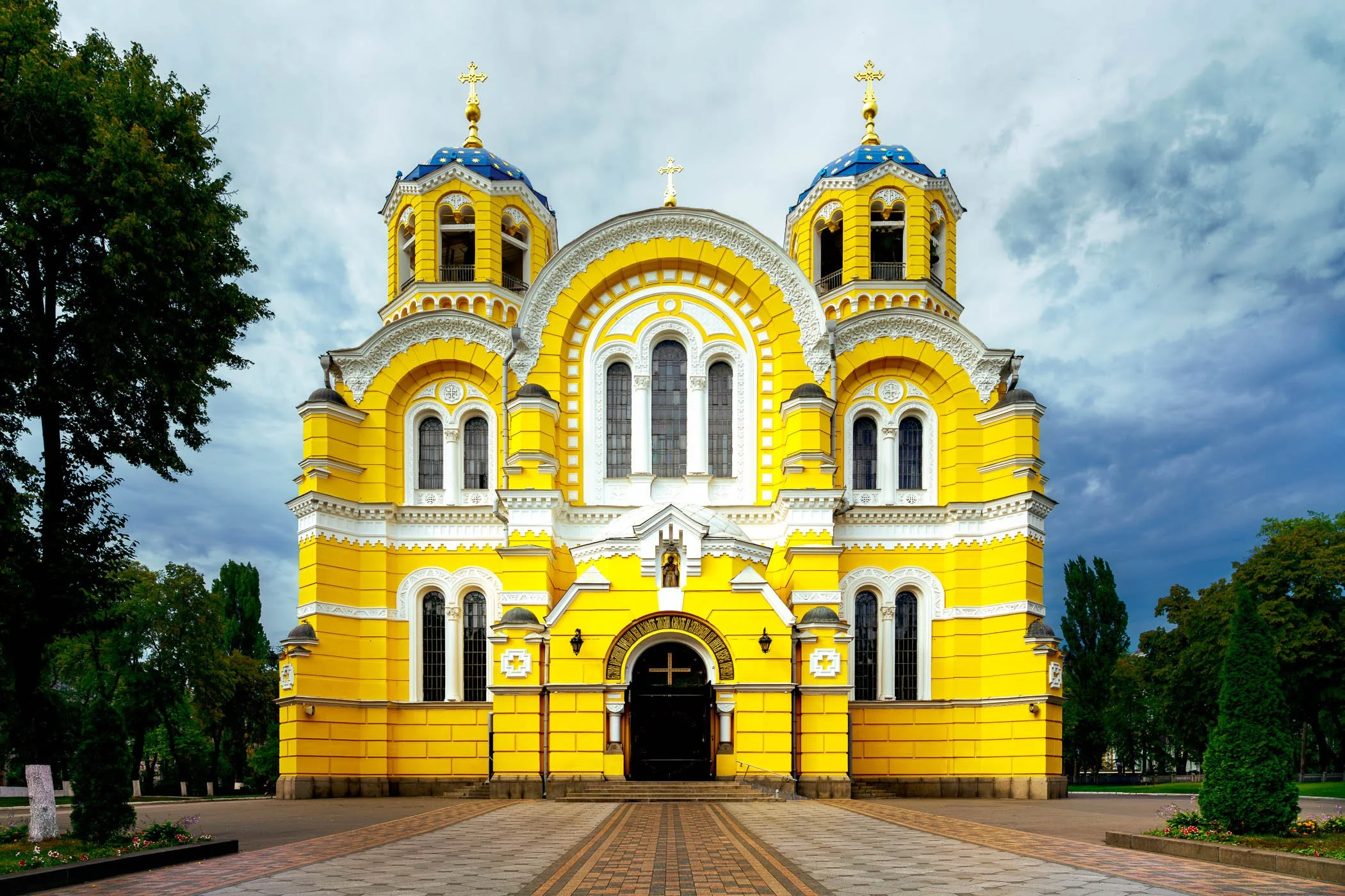 St Volodymyr's Cathedral An exterior view highlighting the vibrant yellow Neo-Byzantine architecture of Volodymyr's Cathedral in central Kyiv.