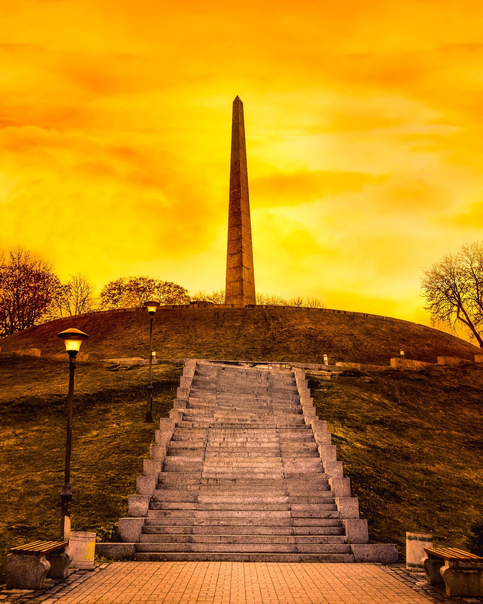Monument to the Unknown Soldier A solemn shot of the memorial obelisk overlooking the city, honoring fallen soldiers in Kyiv's Park of Eternal Glory.