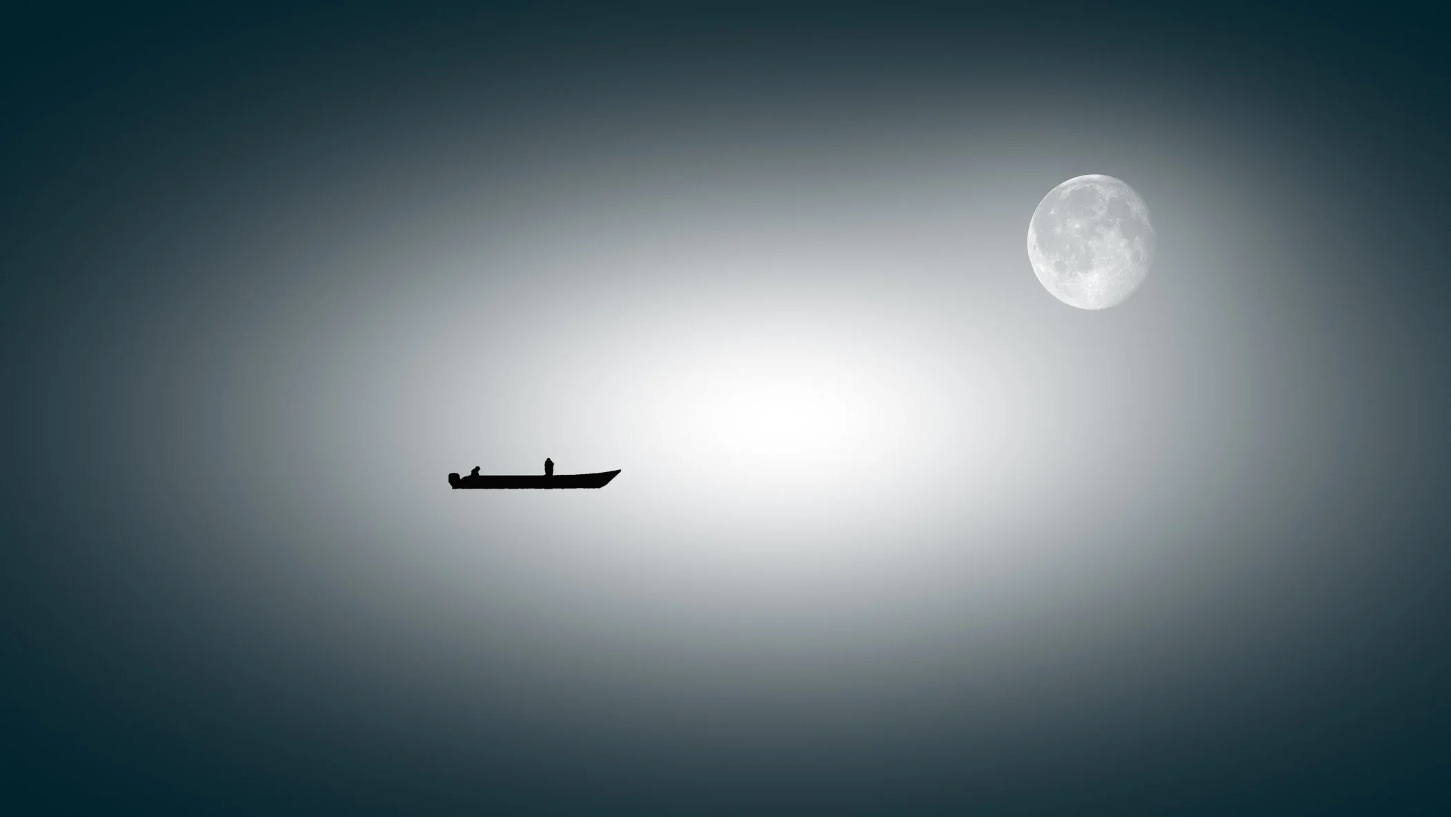 Moonlit Solitude A moody night-time photograph capturing subtle moonlight washing over the calm waters of the sea.