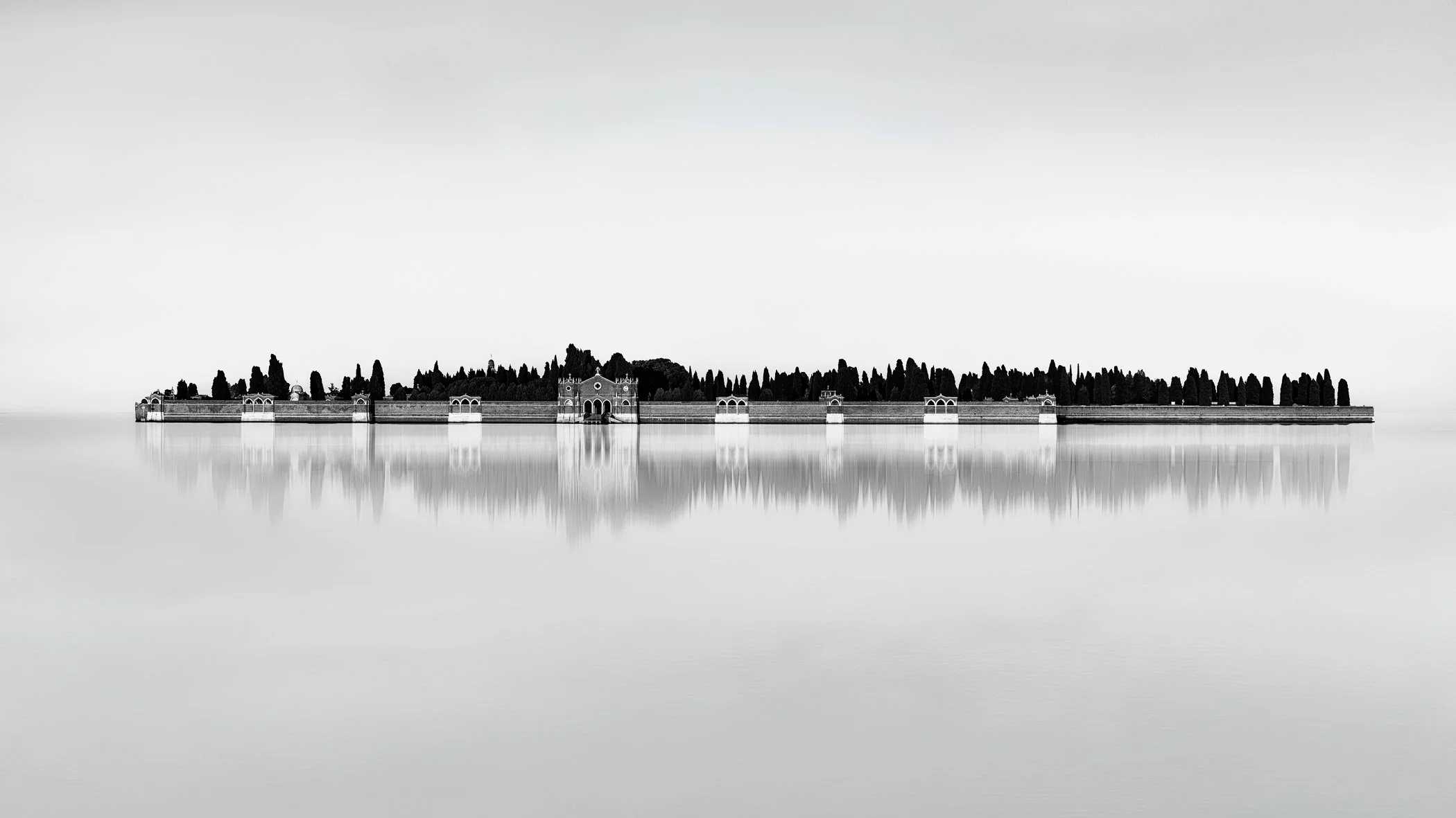 Eternal Reflections Symmetrical reflections of minimal architectural pillars floating seamlessly in quiet water.