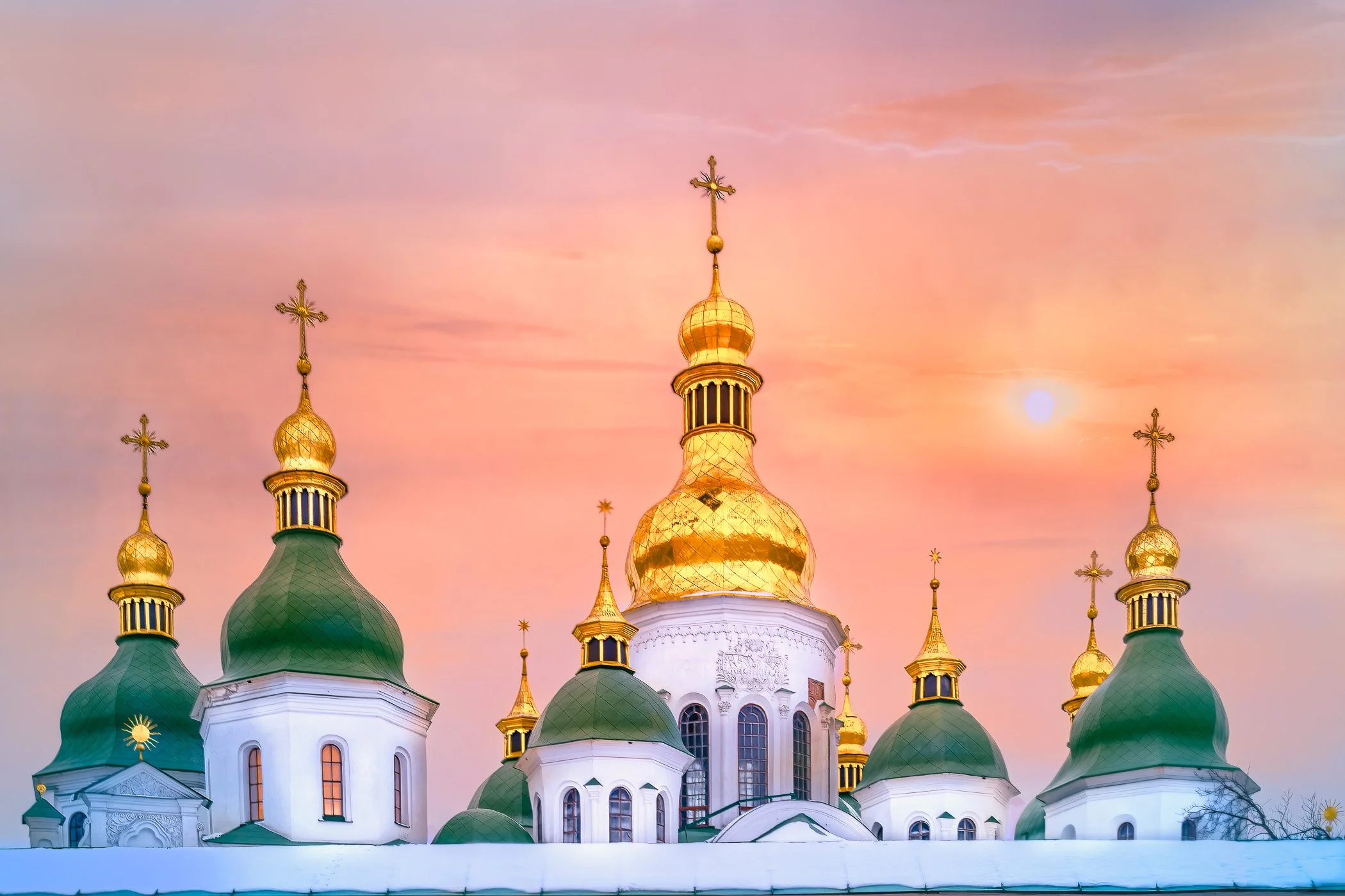 The Domes of Saint Sophia A close-up view focusing on the intricate details and gilded domes of Saint Sophia Cathedral.