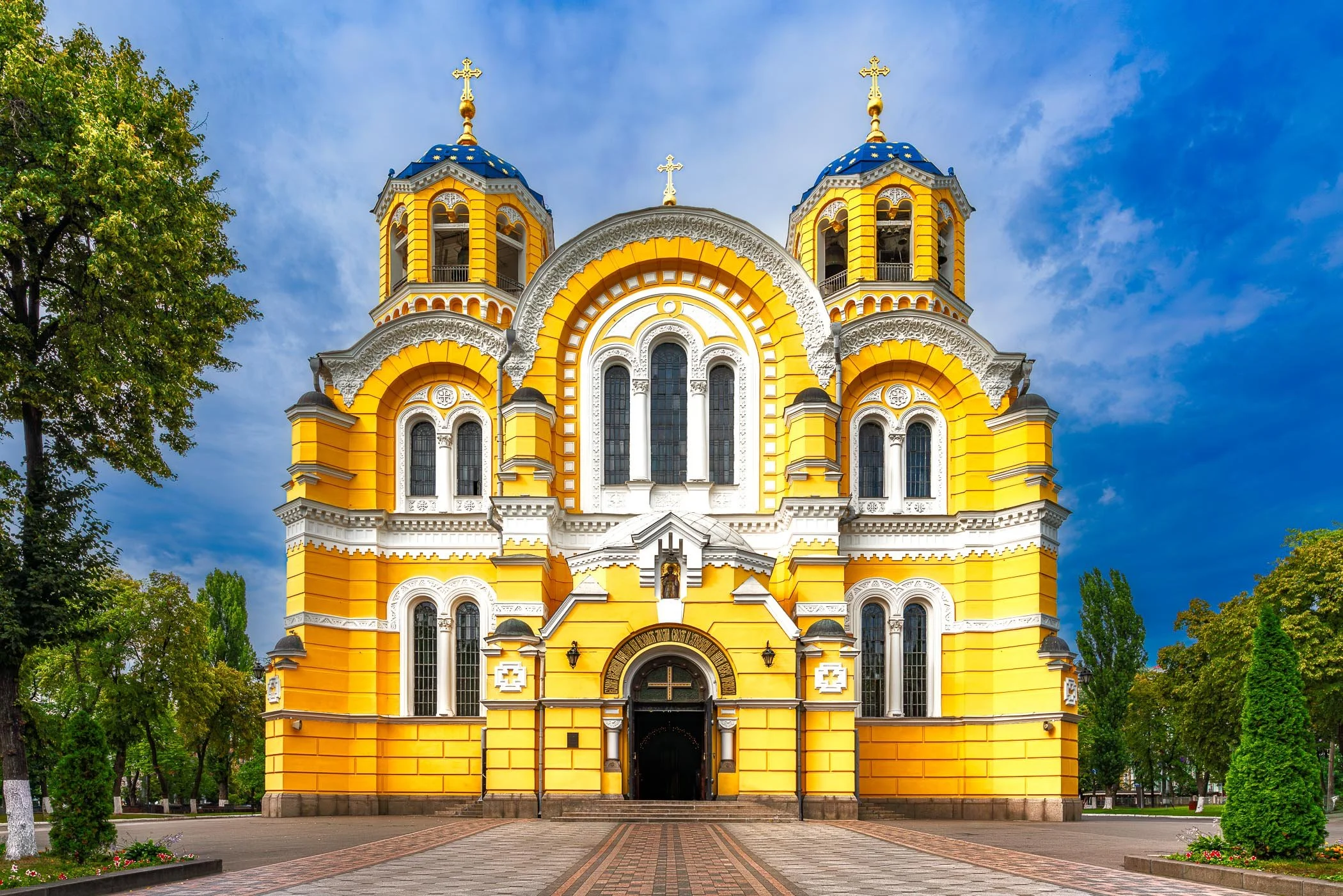 Saint Volodymyrs Cathedral<br>An exterior view highlighting the vibrant yellow Neo-Byzantine architecture of Volodymyr's Cathedral in central Kyiv.
